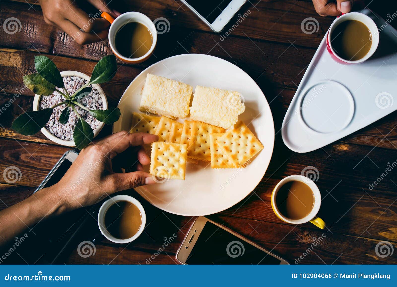 People are eating biscuits stock photo. Image of lunch 102904066