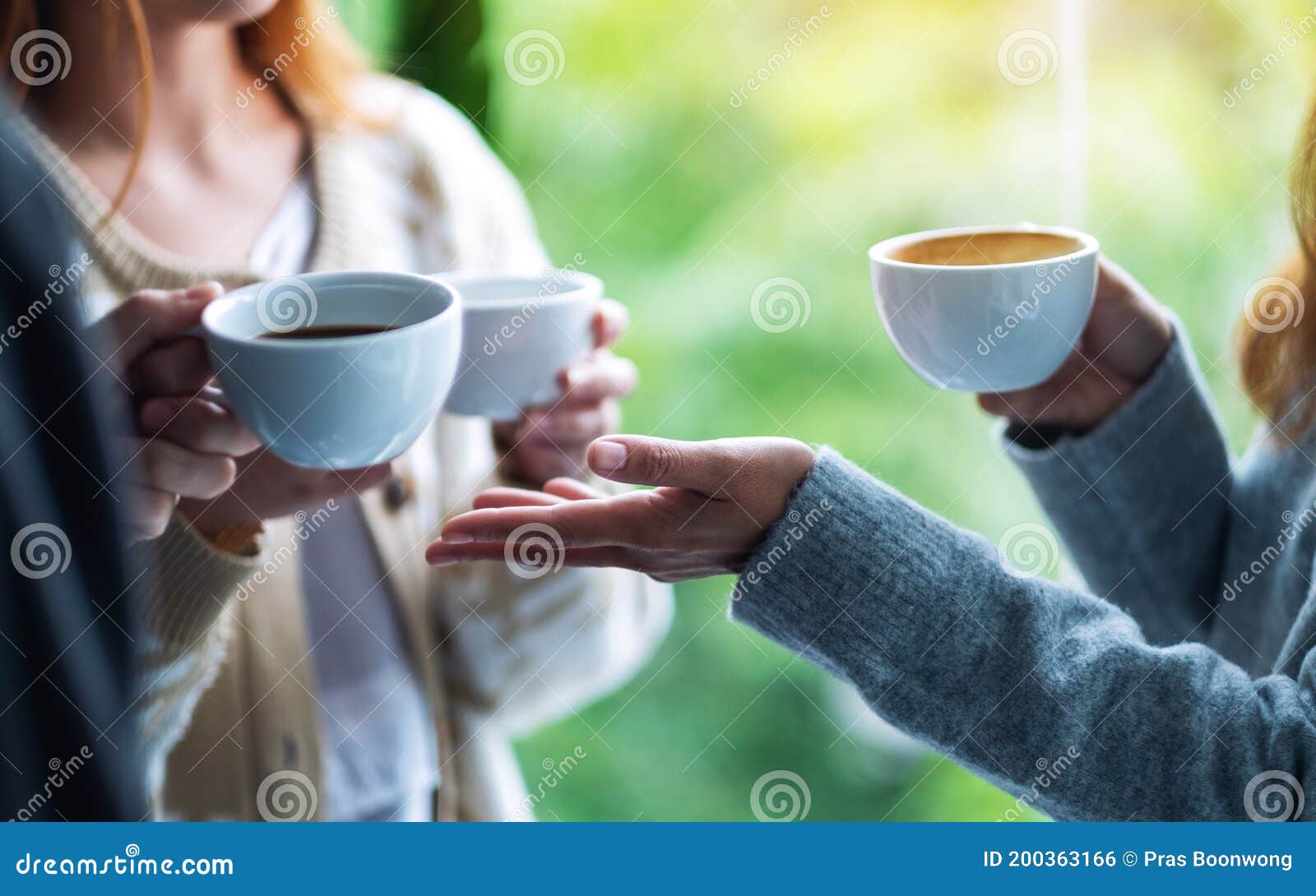 People Enjoyed Talking and Drinking Coffee Together Stock Photo Image