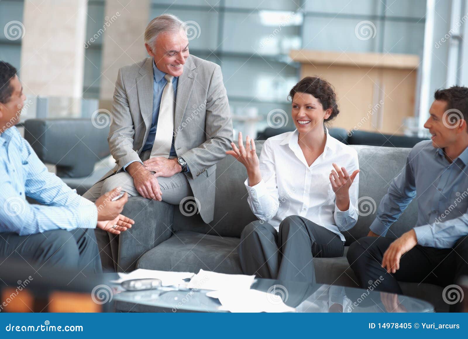 people enjoying a casual talk at the office lounge