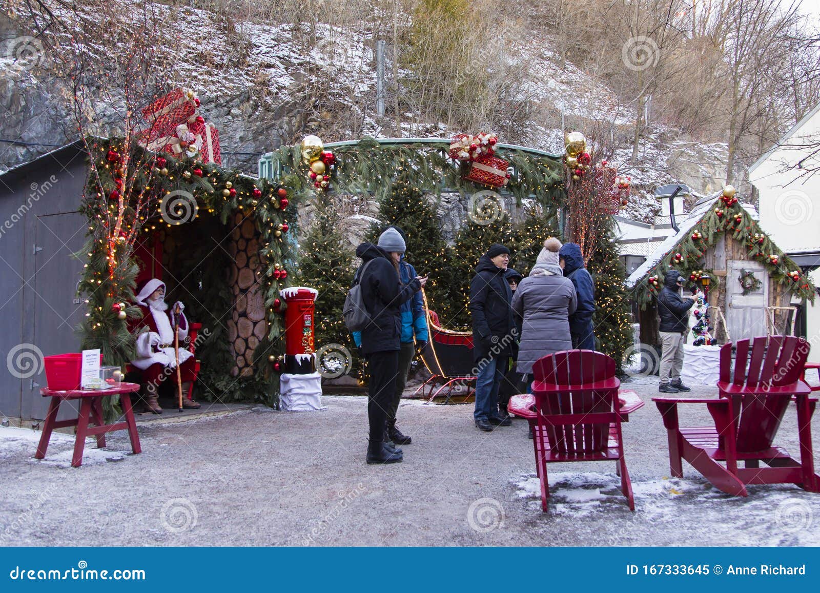 People Gathered Around Santa Claus and Festive Christmas ...