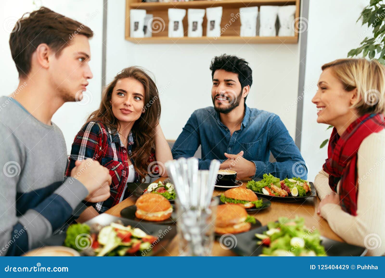 Please Have A Meal People Having Dinner Together at Table in Cafe Stock Image - Image of