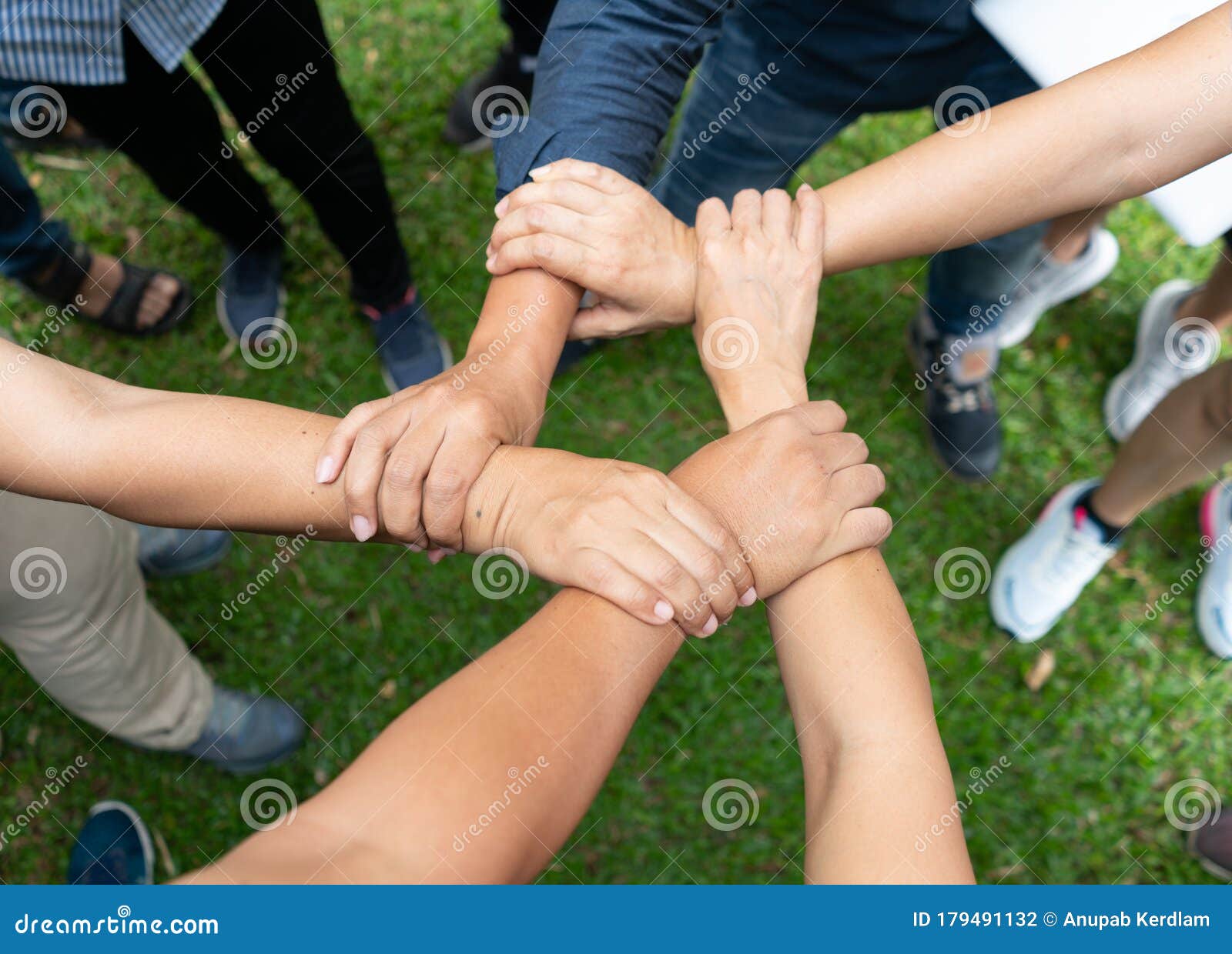people are join hand together with trust and success in teamwork.