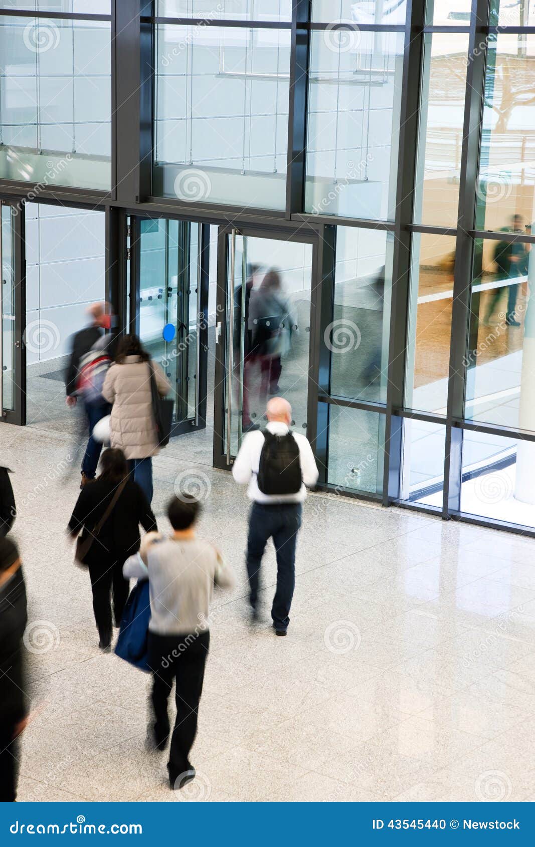 People Leaving an Office Building, Motion Blur Editorial Image - Image
