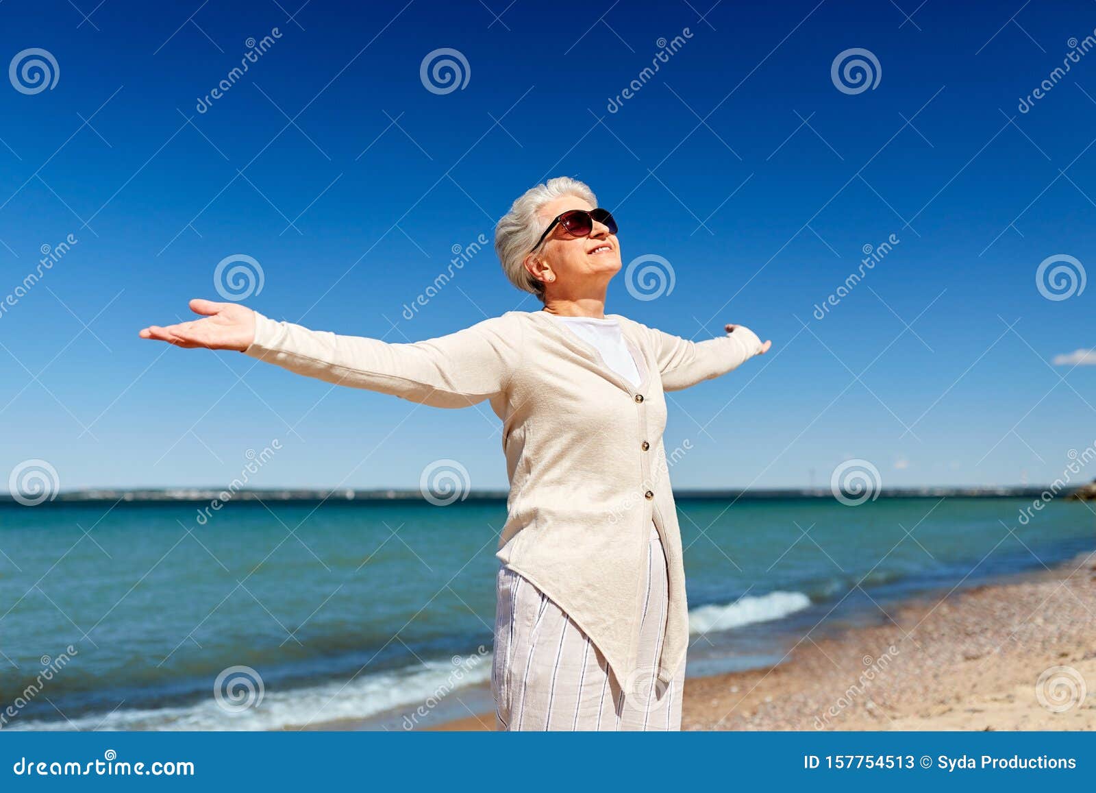 Portrait of Senior Woman in Sunglasses on Beach Stock Image - Image of ...