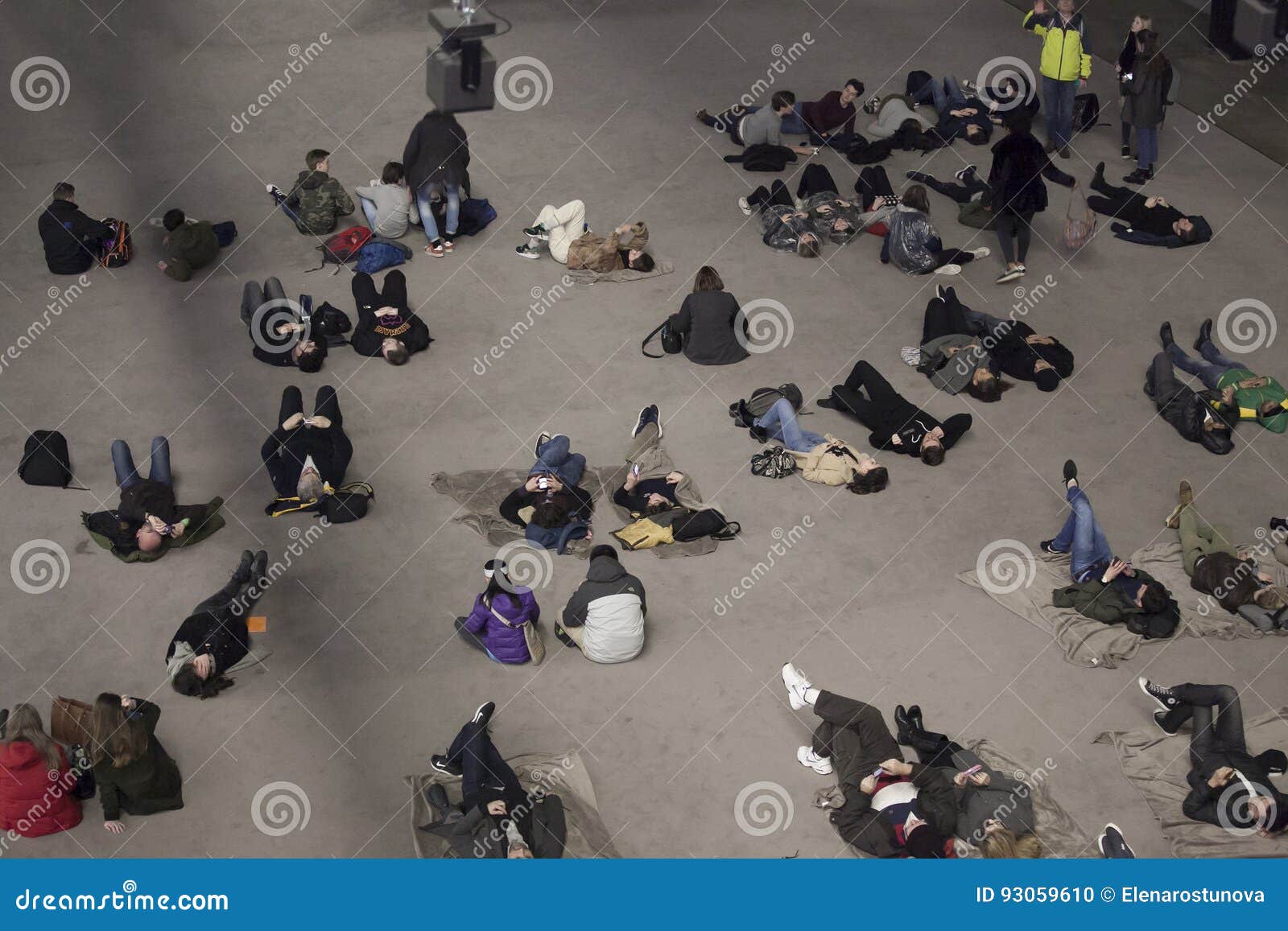 People Lie On The Floor In The Turbine Hall In The Tate Modern In