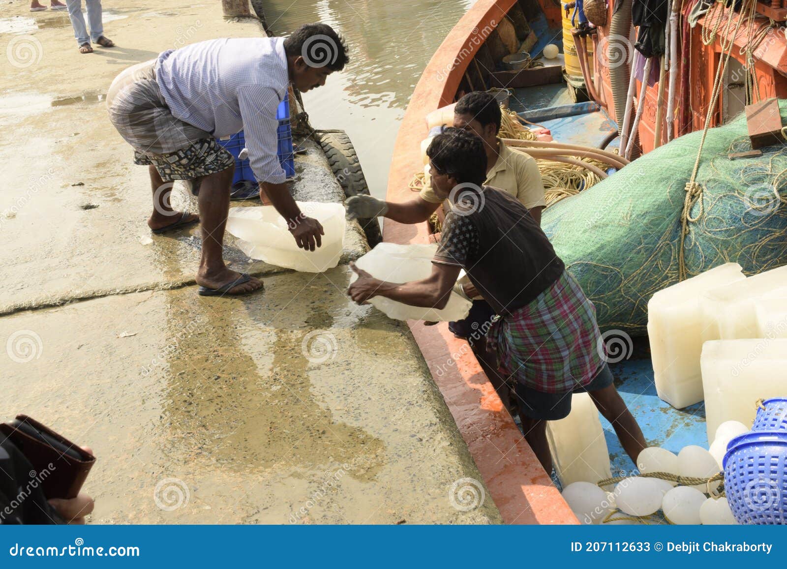 People Loading Ice Blocks, Fishing Nets for Fishing Voyage at Frezarganj  Fish Harbor, West Bengal, India Editorial Stock Photo - Image of voyage,  loading: 207112633