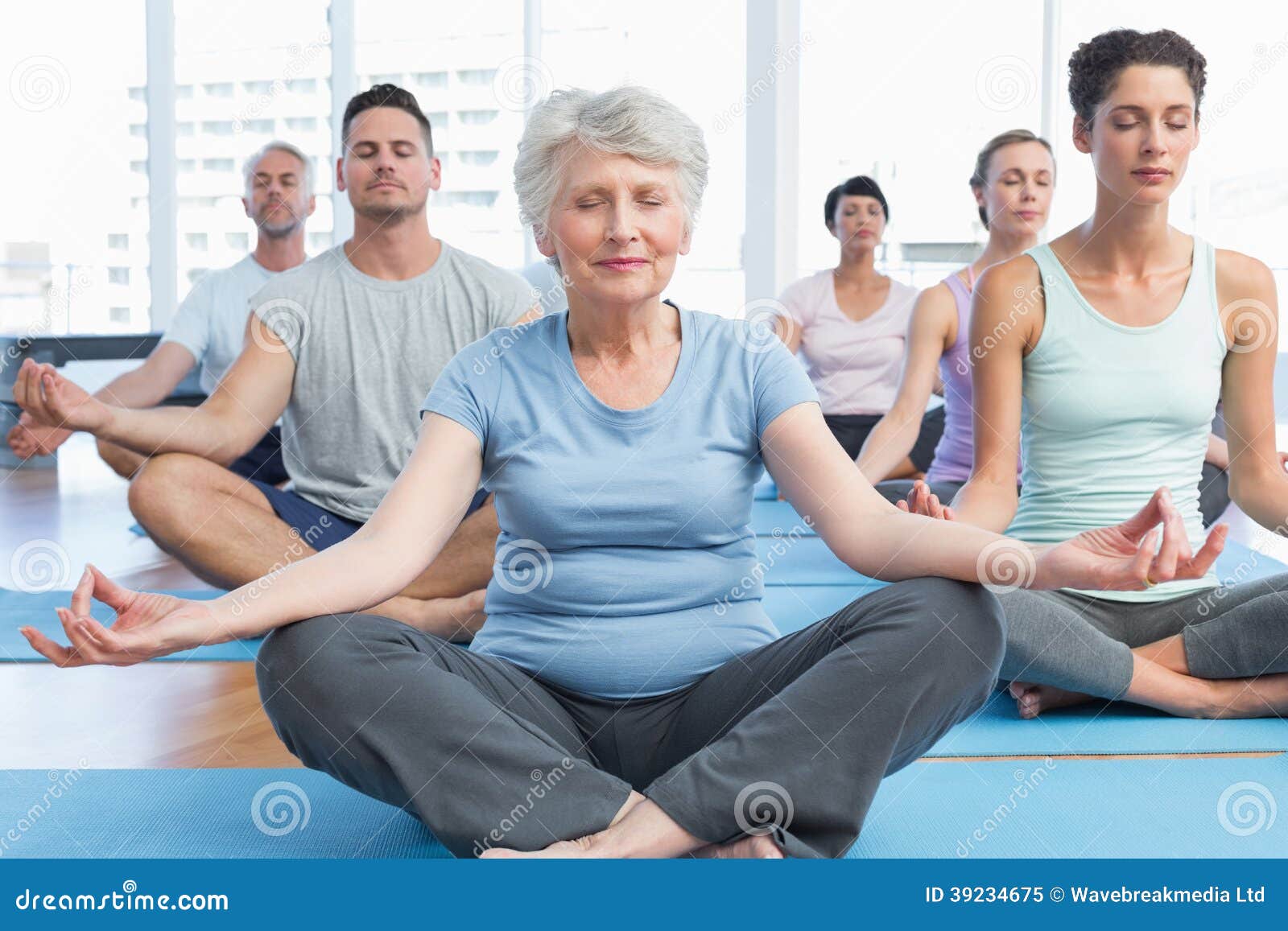 People in Lotus Pose with Eyes Closed at Fitness Studio Stock Image ...