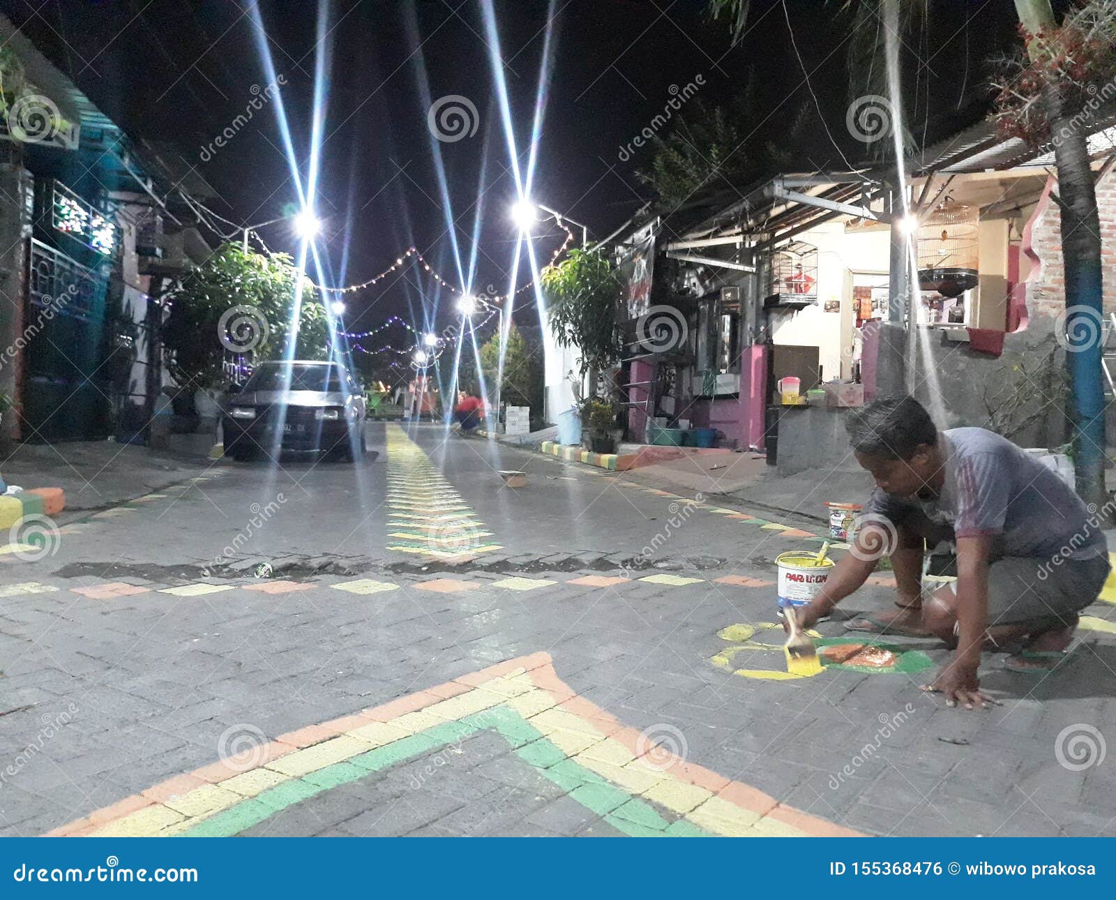 Gresik, East Java / Indonesia - July 28, 2019 : People Painted the Road