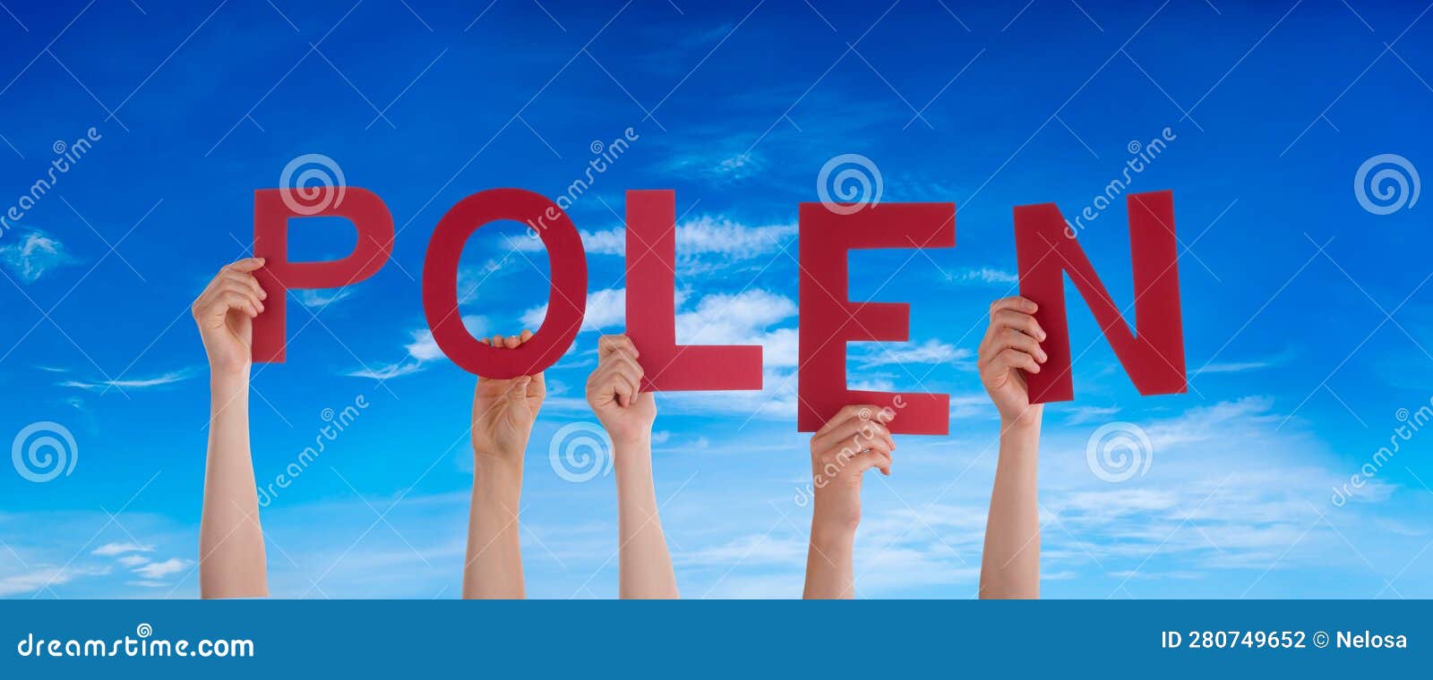 people hands building word polen means poland, blue sky