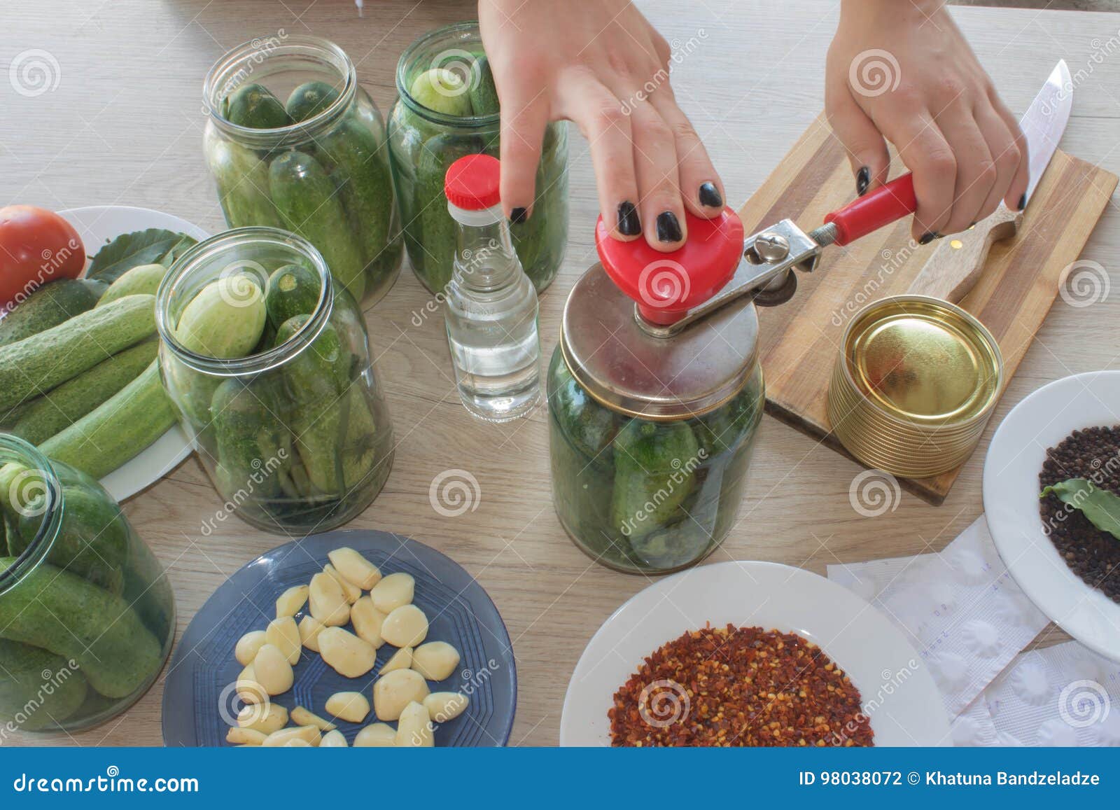 People are Preparing in the Kitchen. Pickling Cucumbers, Preparation for Winter Salting Stock