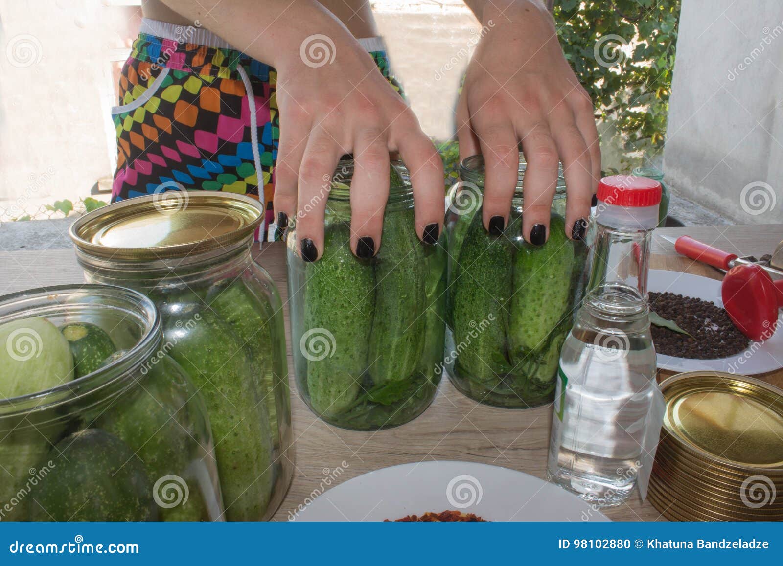 People are Preparing in the Kitchen. Pickling Cucumbers, Preparation for Winter Salting Stock