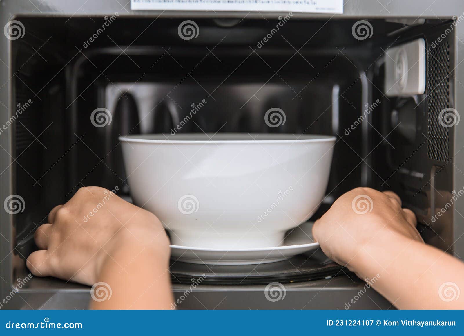 Heating Food in a Microwave Oven Stock Photo - Image of kitchen, door:  236057510