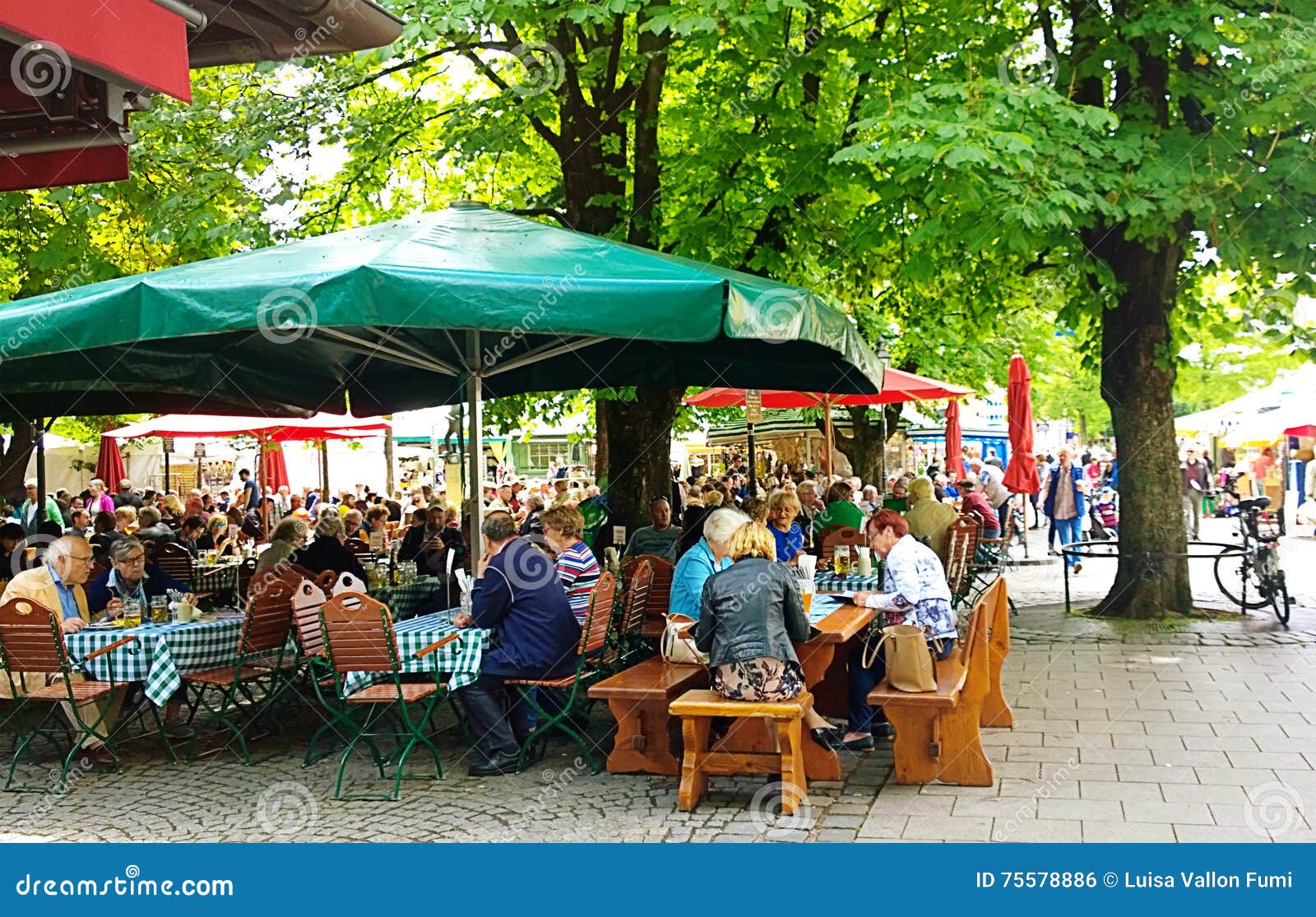 People Seat At Beer Garden In Viktualienmarkt Gourmet Point In