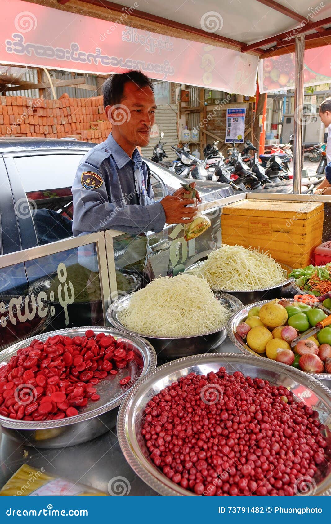 People Selling Snacks on Street in Mandalay, Myanmar Editorial