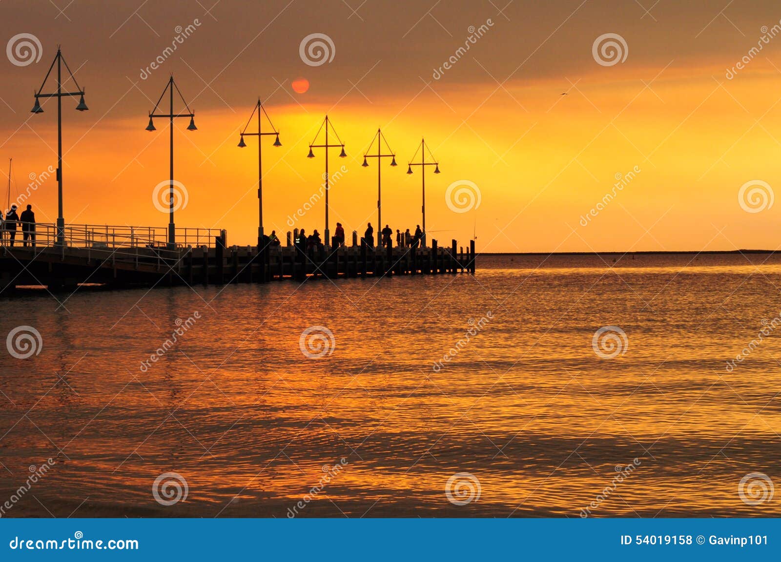 People Silhoutte at Sunset Near Ocean Stock Photo - Image of peace ...