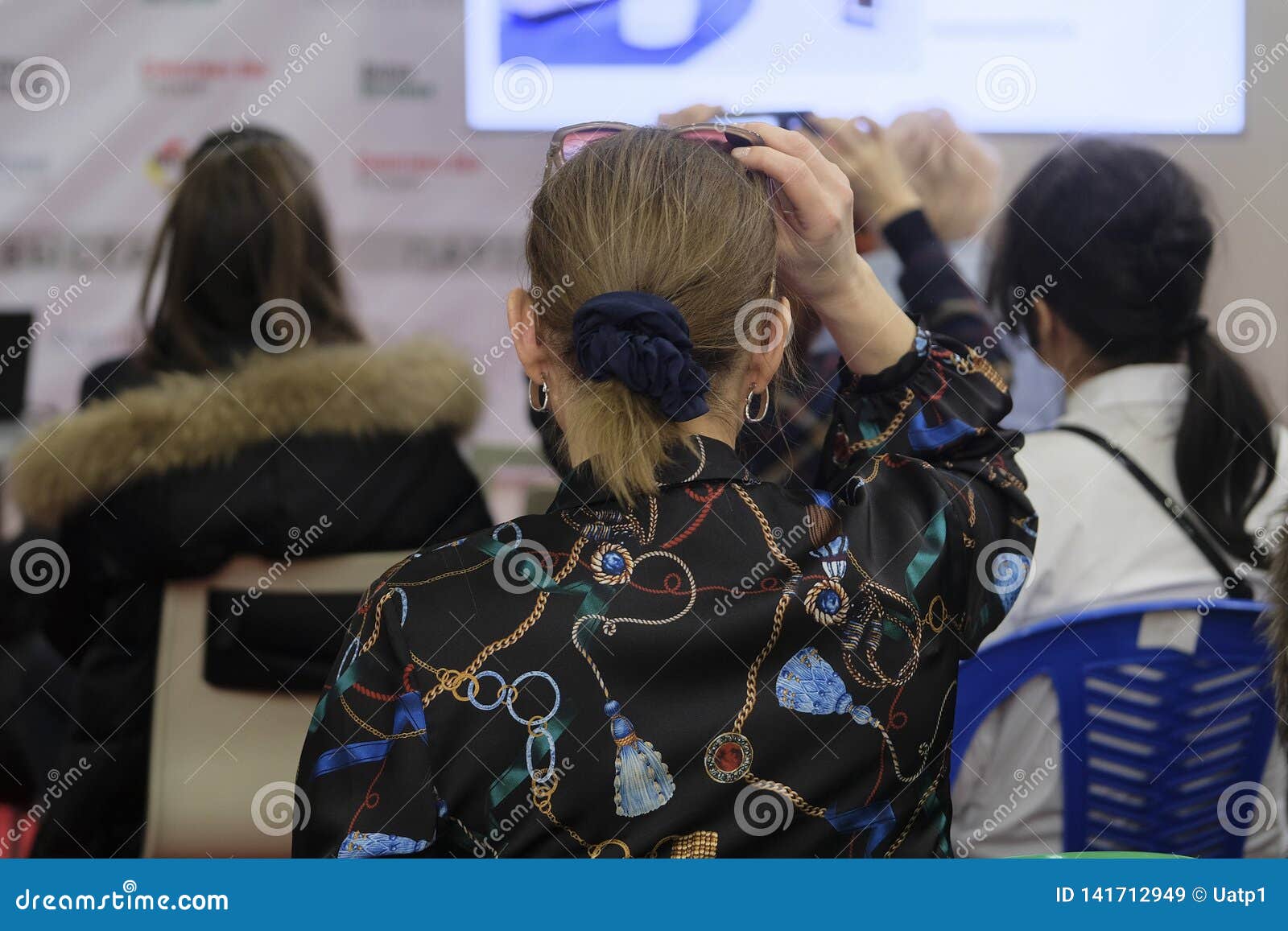 people sitting at a conference