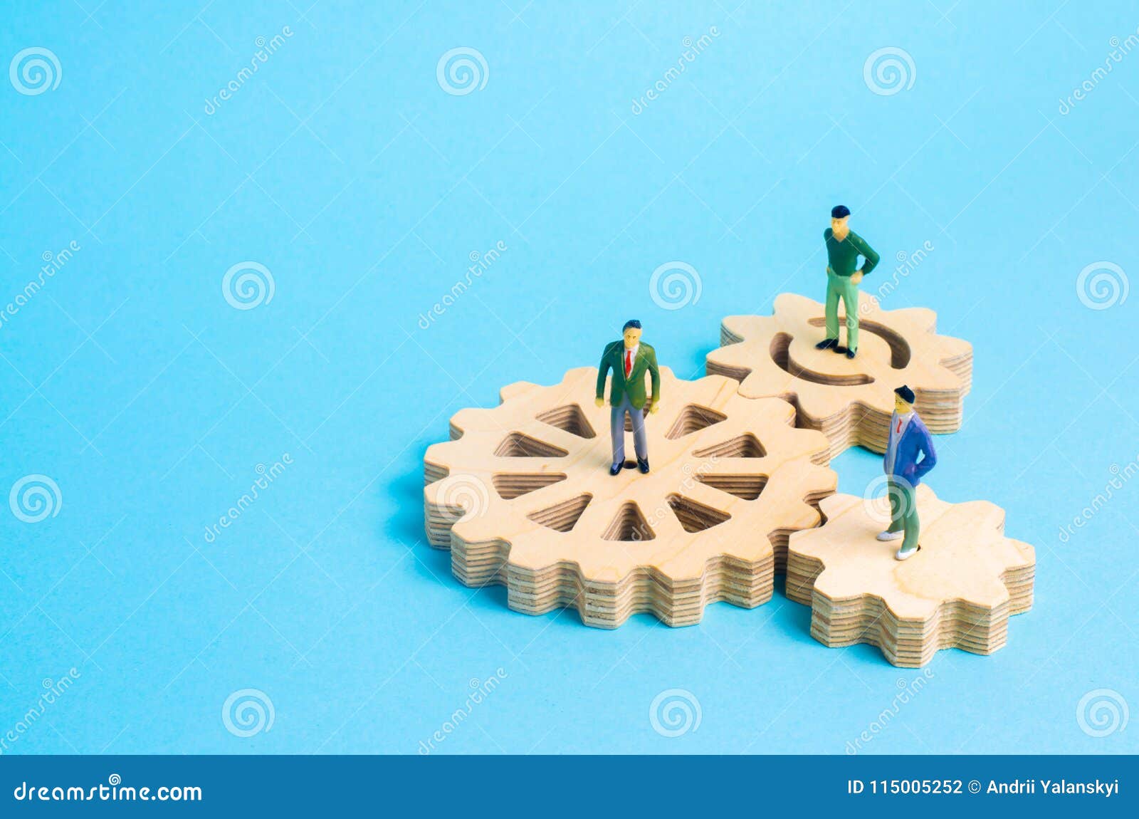 people stand on gears. concept of business ideas and investments, cooperation and teamwork with business partners and employees.