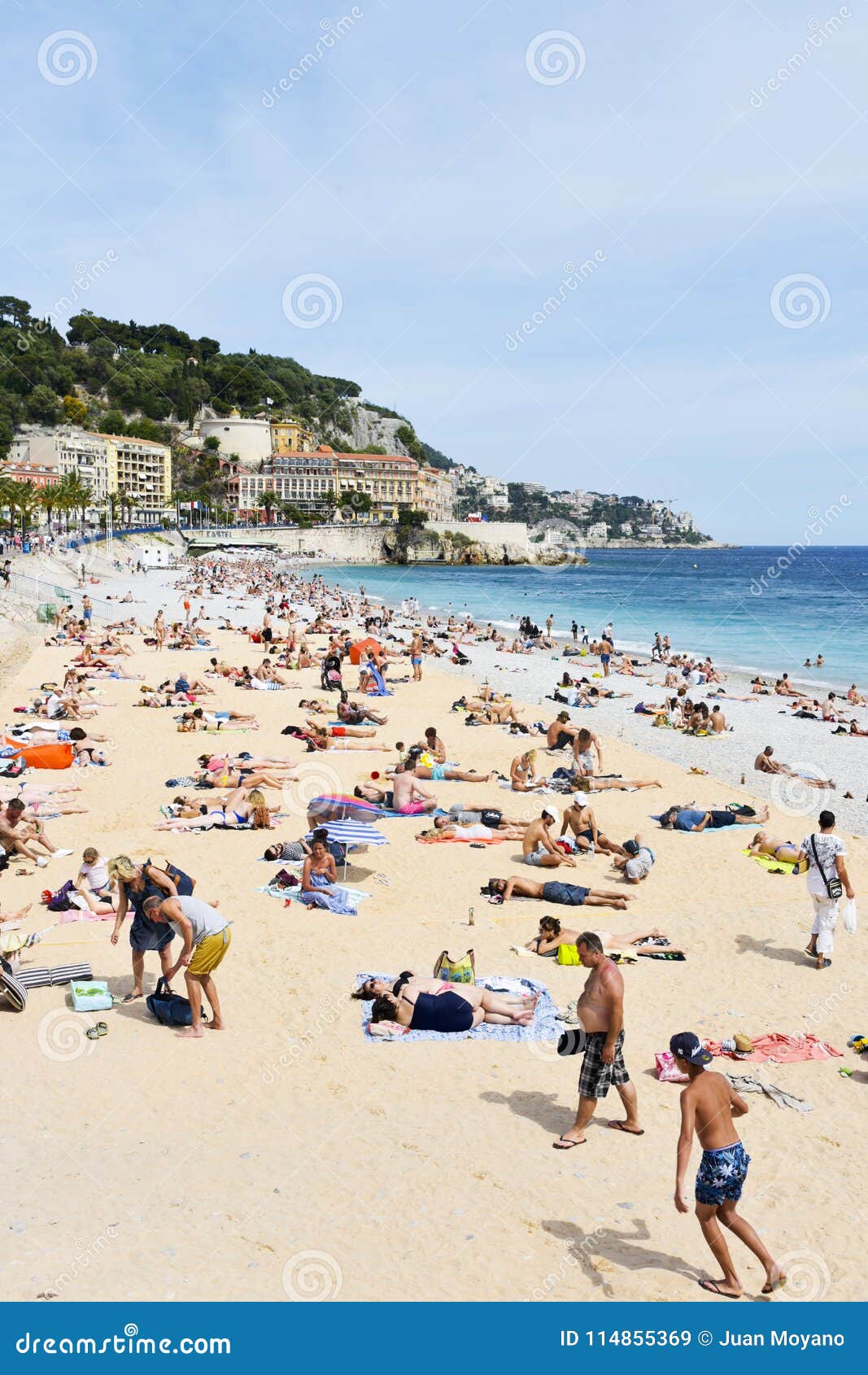 People Sunbathing On The Beach In Antibes, France 