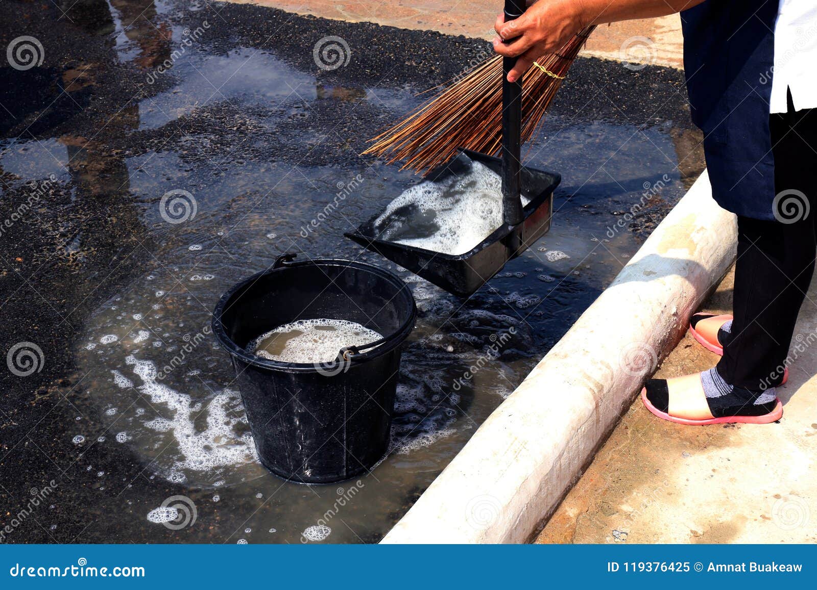 people are sweeping dirty water at ground streets, cleaner floor, housemaid, housekeeper, homemaker, maidservant, maid