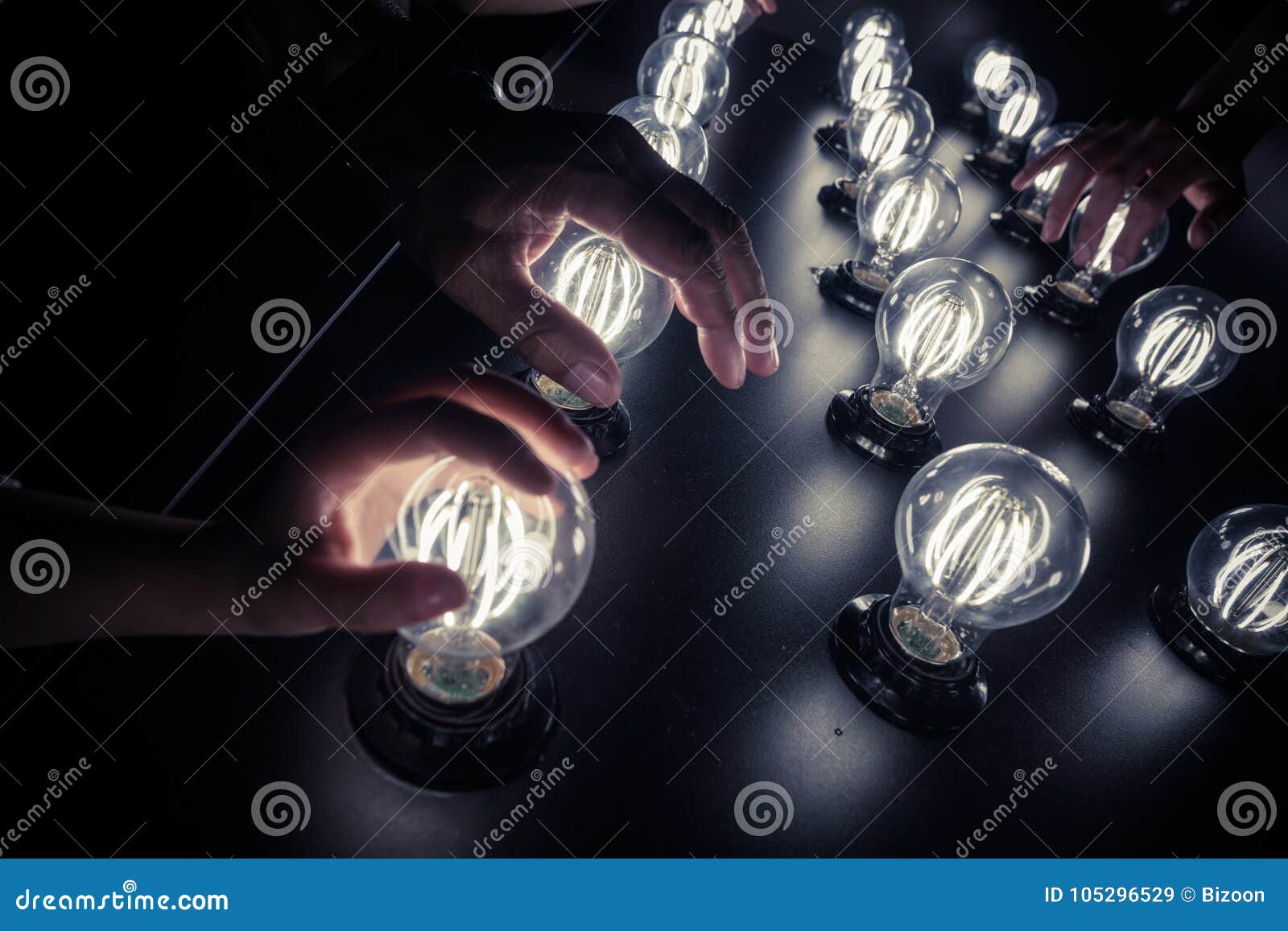 People Touching Light Bulbs Stock Image Image of hand, spotlight