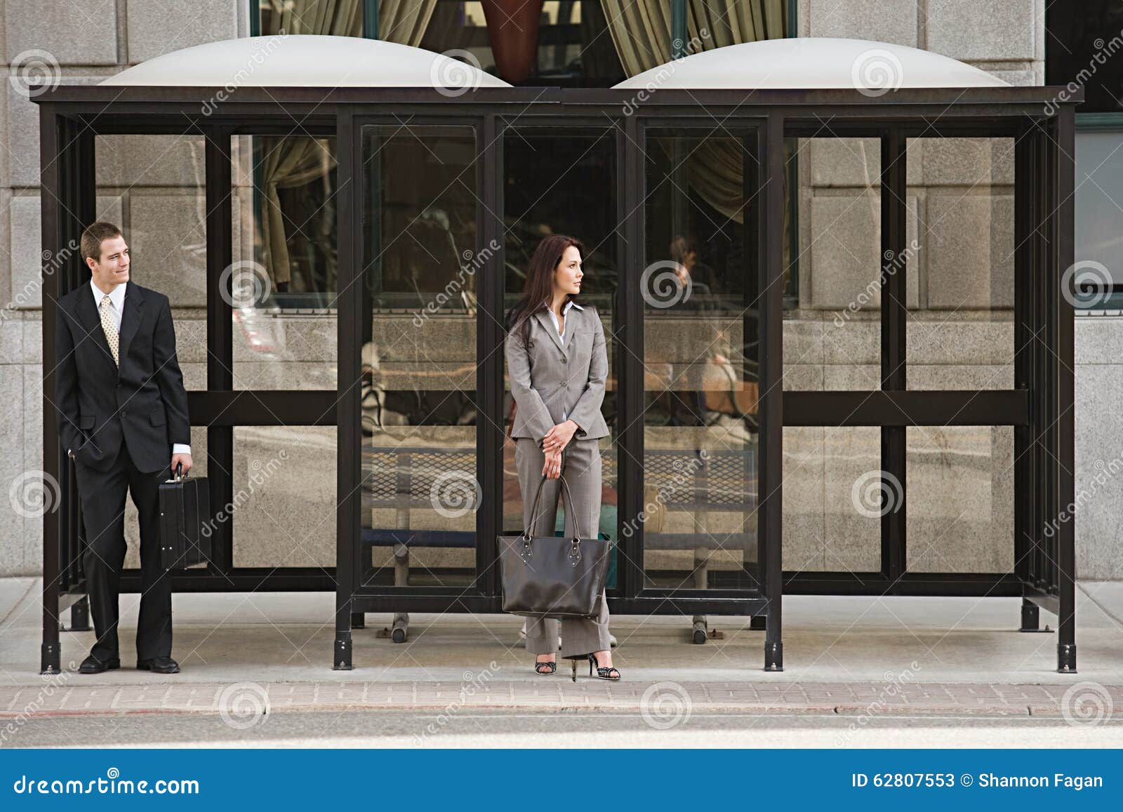 people waiting at bus stop