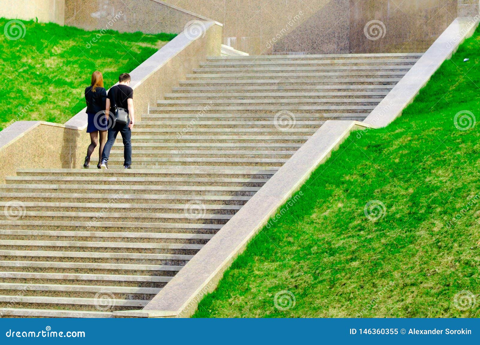 People Walking Along the Promenade, Biking and Scooters Stock Image ...