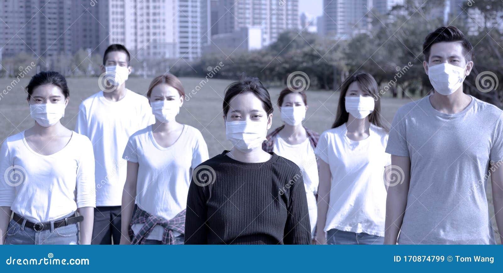 people wearing  protection mask to prevent germ, virus and pm 2.5 micron in city