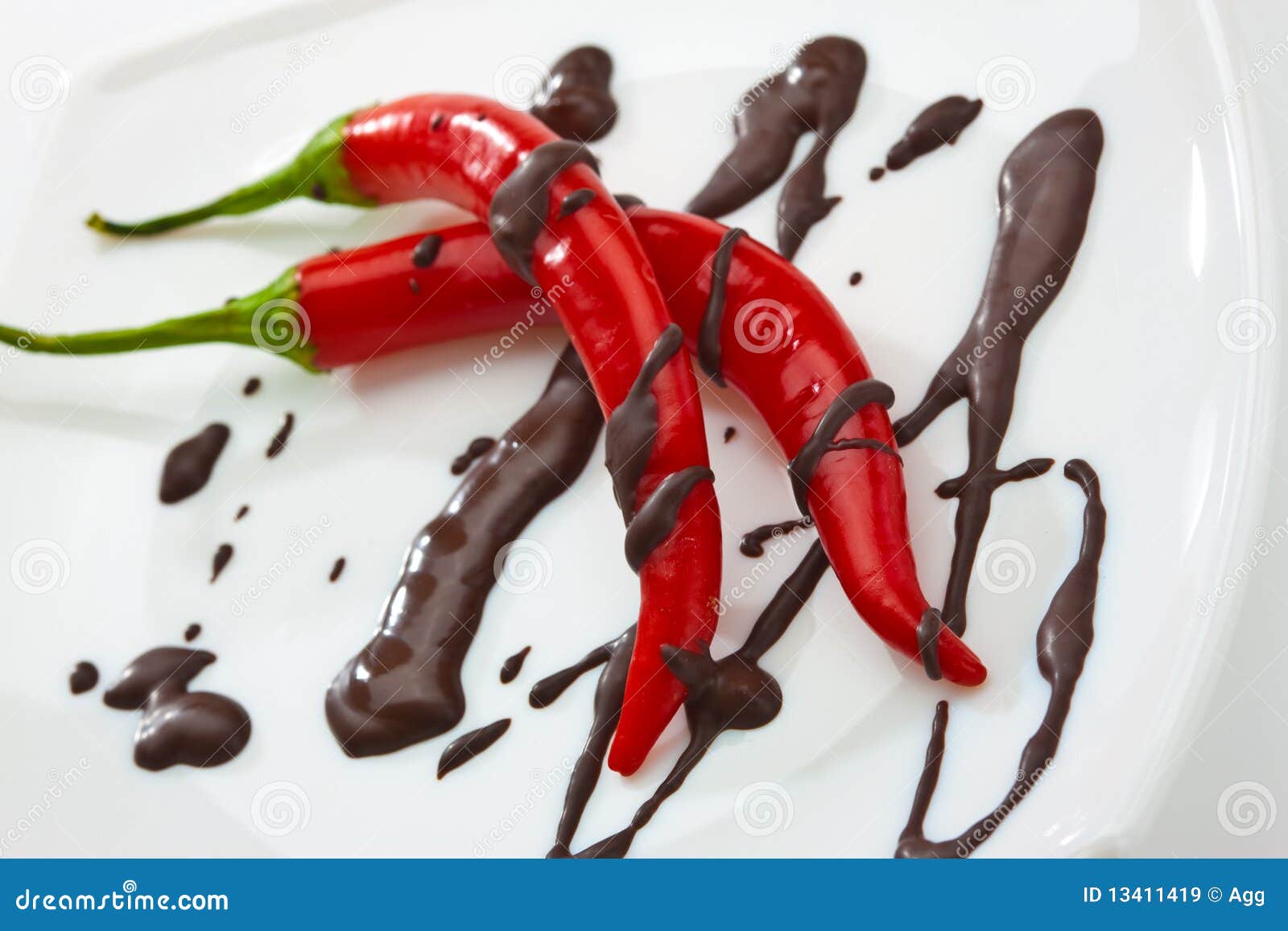 Pepper and chocolate stock image. Image of spice, plate 13411419