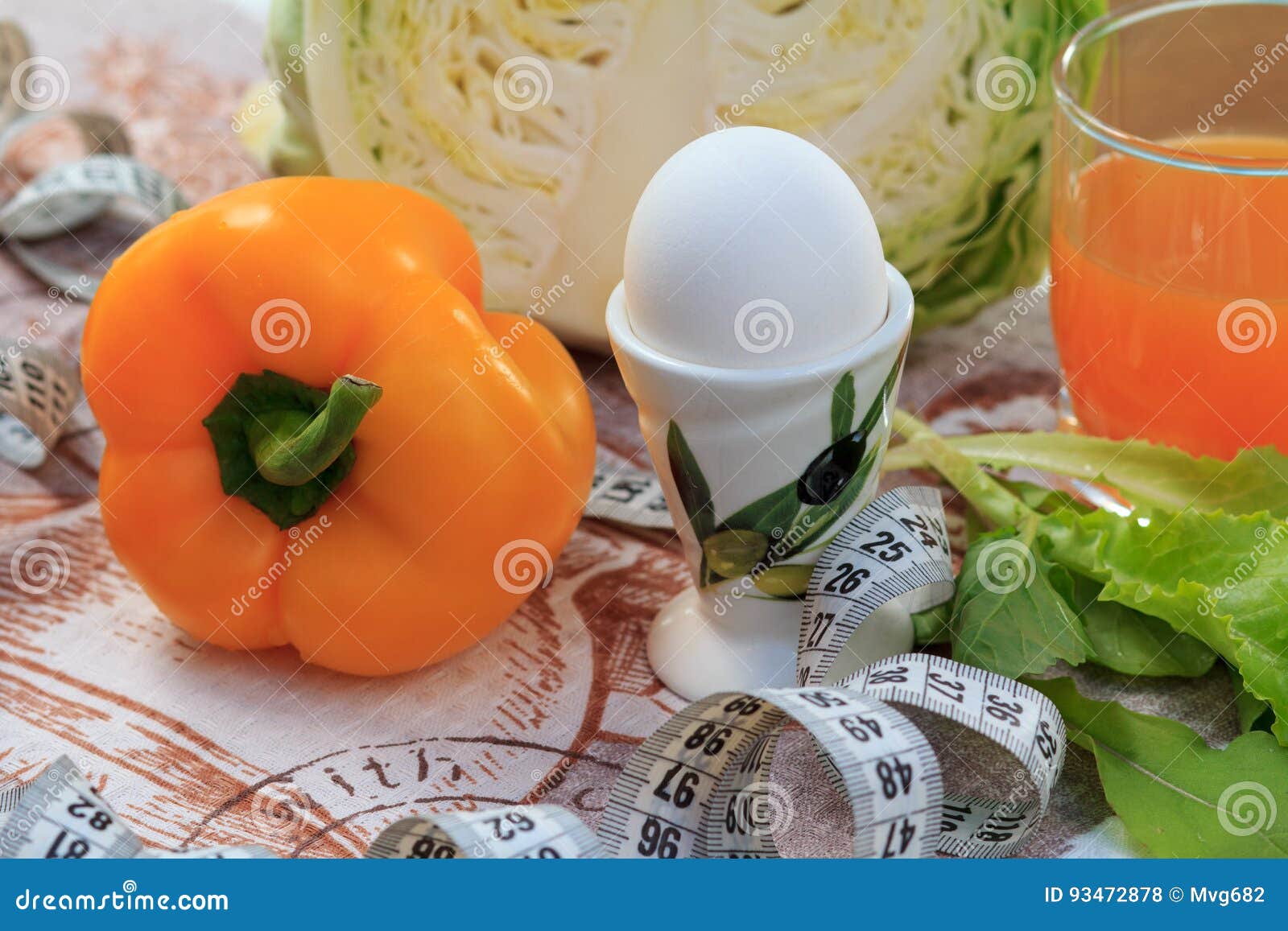 Pepper, Egg, Cabbage, Salad, Ruler and Multivitamin Juice in Glass on ... Pepper, Egg, Cabbage, Salad, Ruler and Multivitamin Juice in Glass on ...