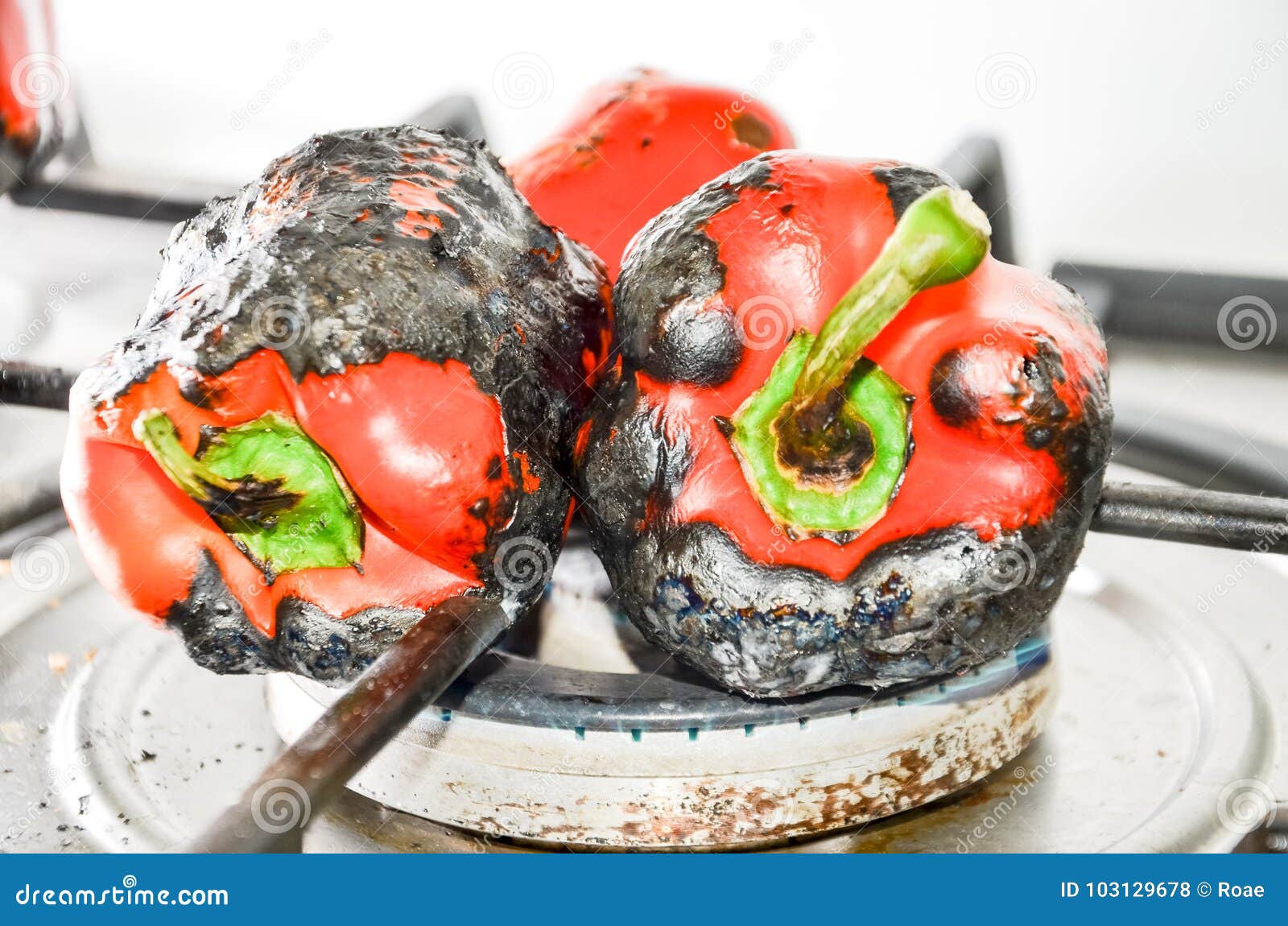 Pepper fired on gas stock photo. Image of grill, fire 103129678