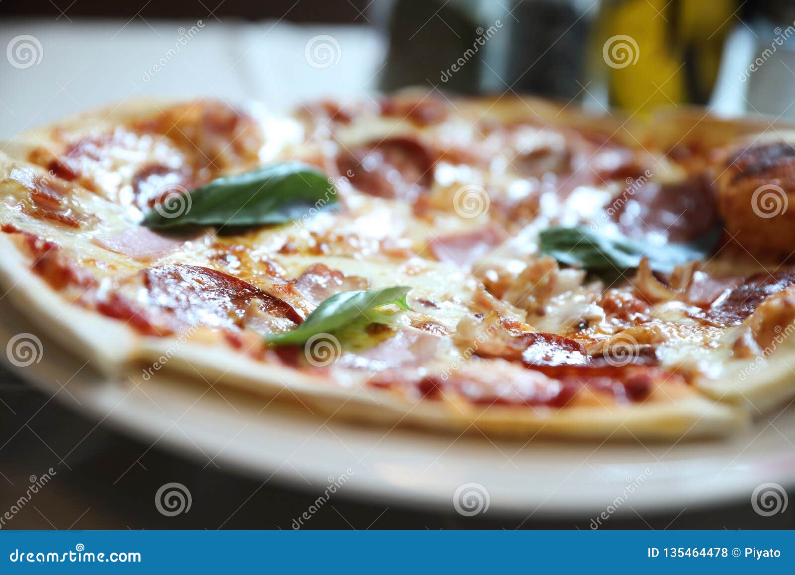 Pepperoni Bacon and Ham Pizza in Restaurant Stock Photo Image of
