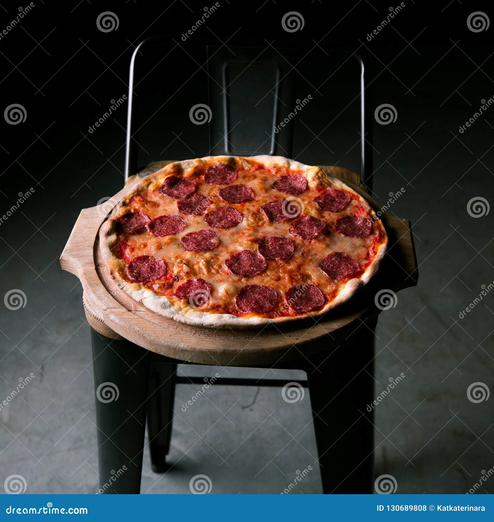 Pepperoni Pizza Cooked in the Oven in a Restaurant Stock Photo Image