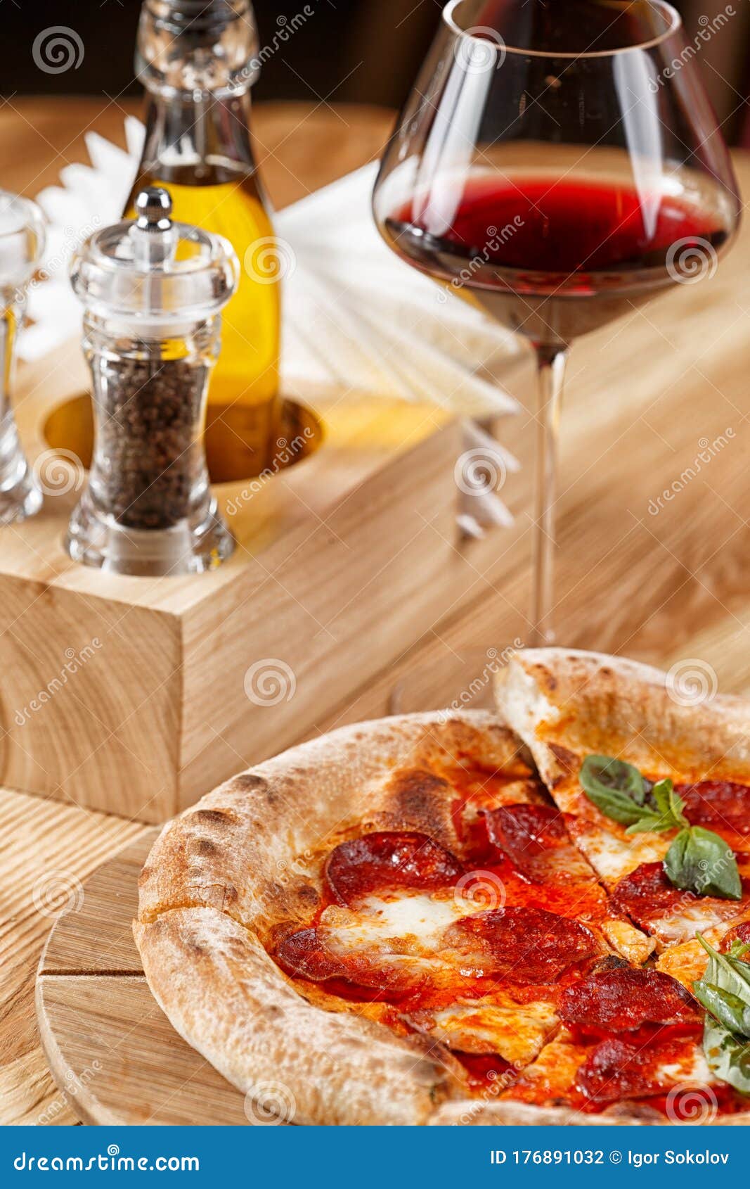 Pepperoni Pizza and a Glass of Wine Stock Photo Image of lying