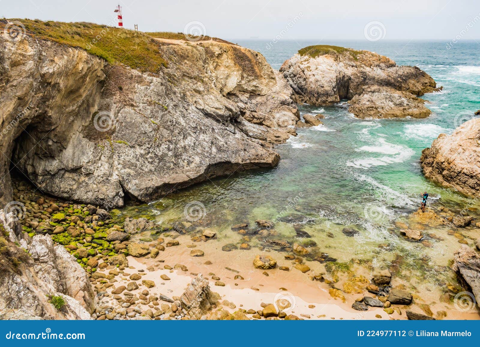 pequena beach with cliff and rocks and clear water in porto covo, sines portugal