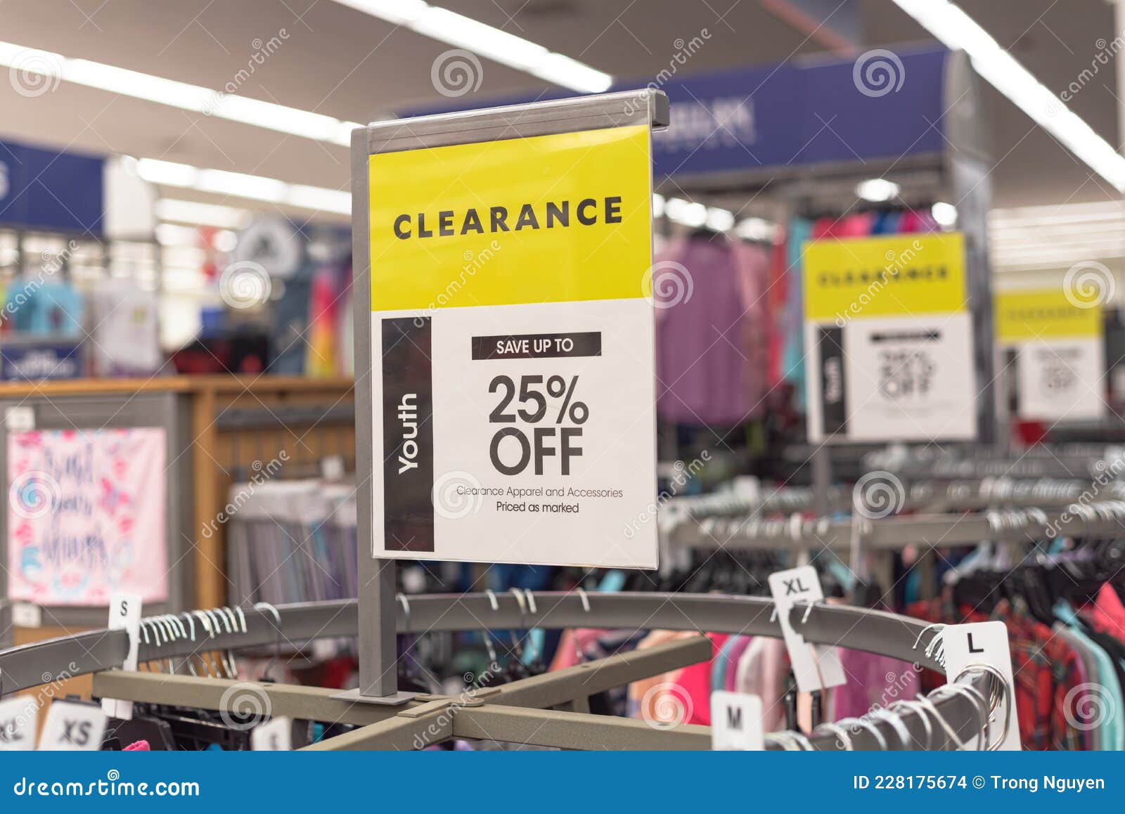 25 Percent Off Clearance Sign on a Round Clothing Rack at Fashion Store in  America Stock Photo - Image of brand, clothing: 228175674