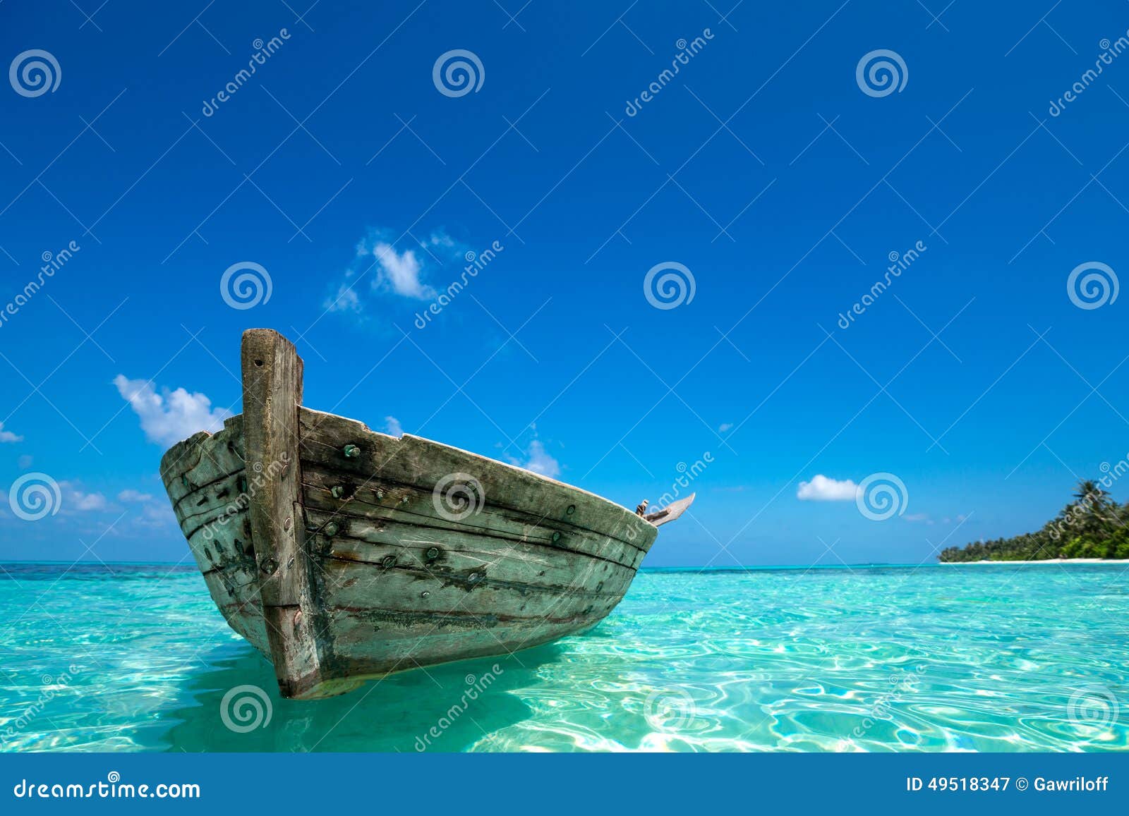 perfect tropical island paradise beach and old boat