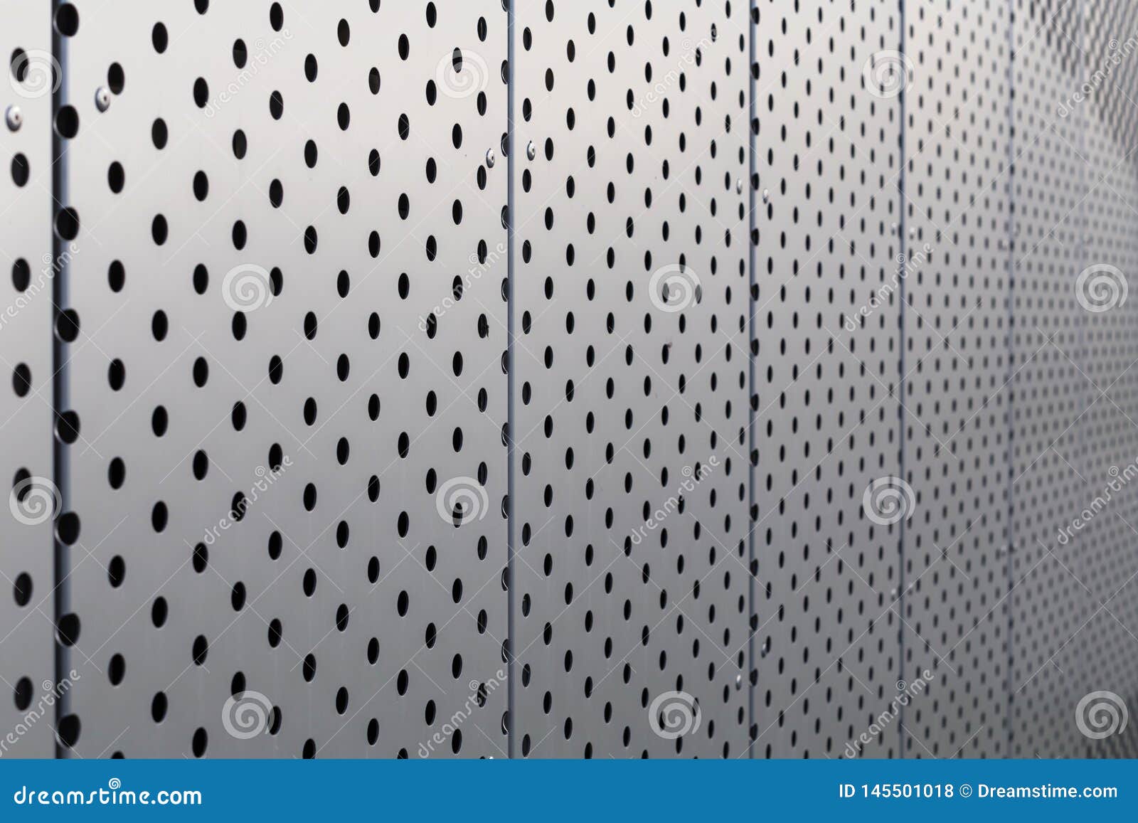 Perforated Metal Panel. Facing of Buildings and Structures Perforated
