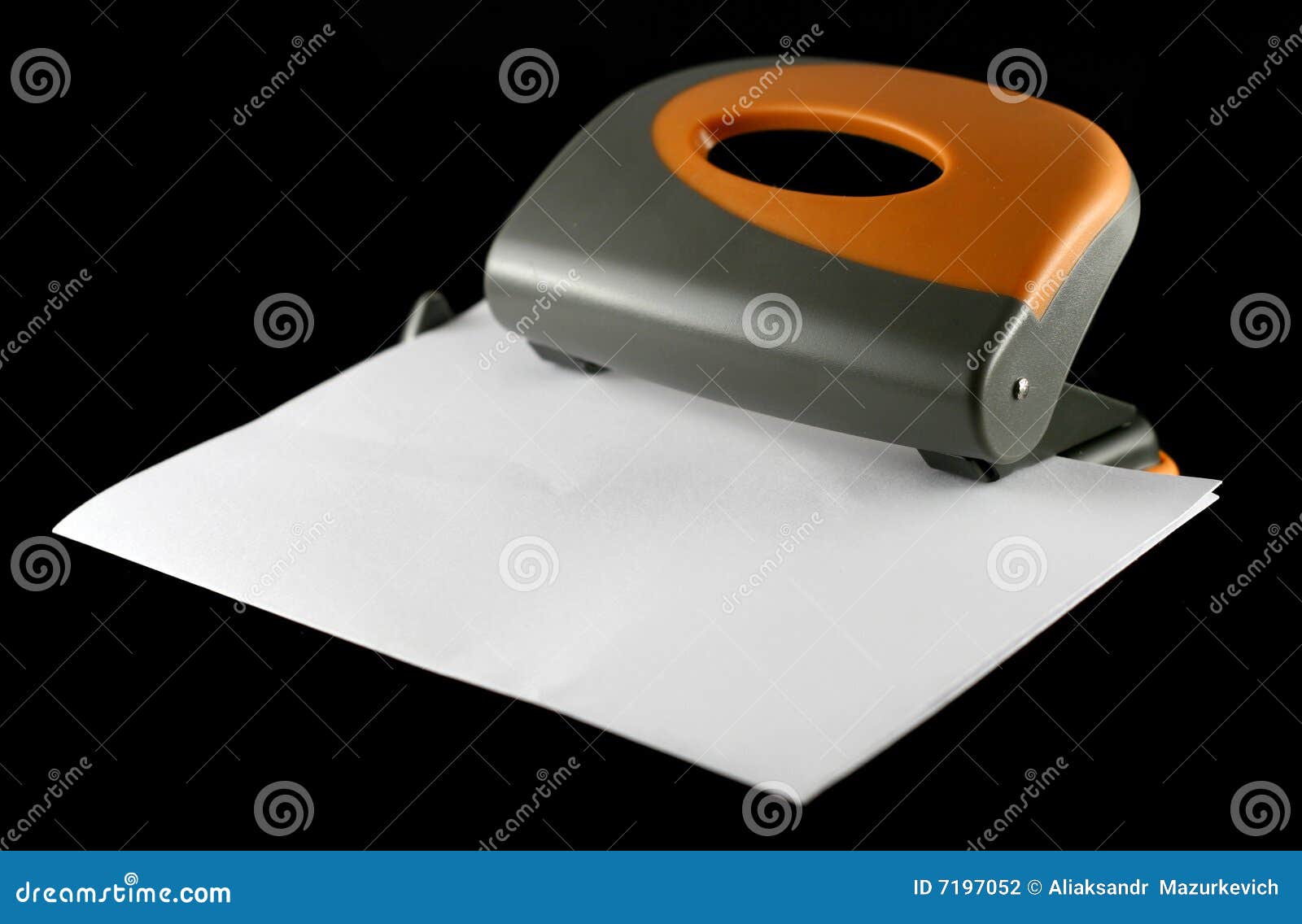 Perforator with Sheet of Paper Stock Photo - Image of puncher