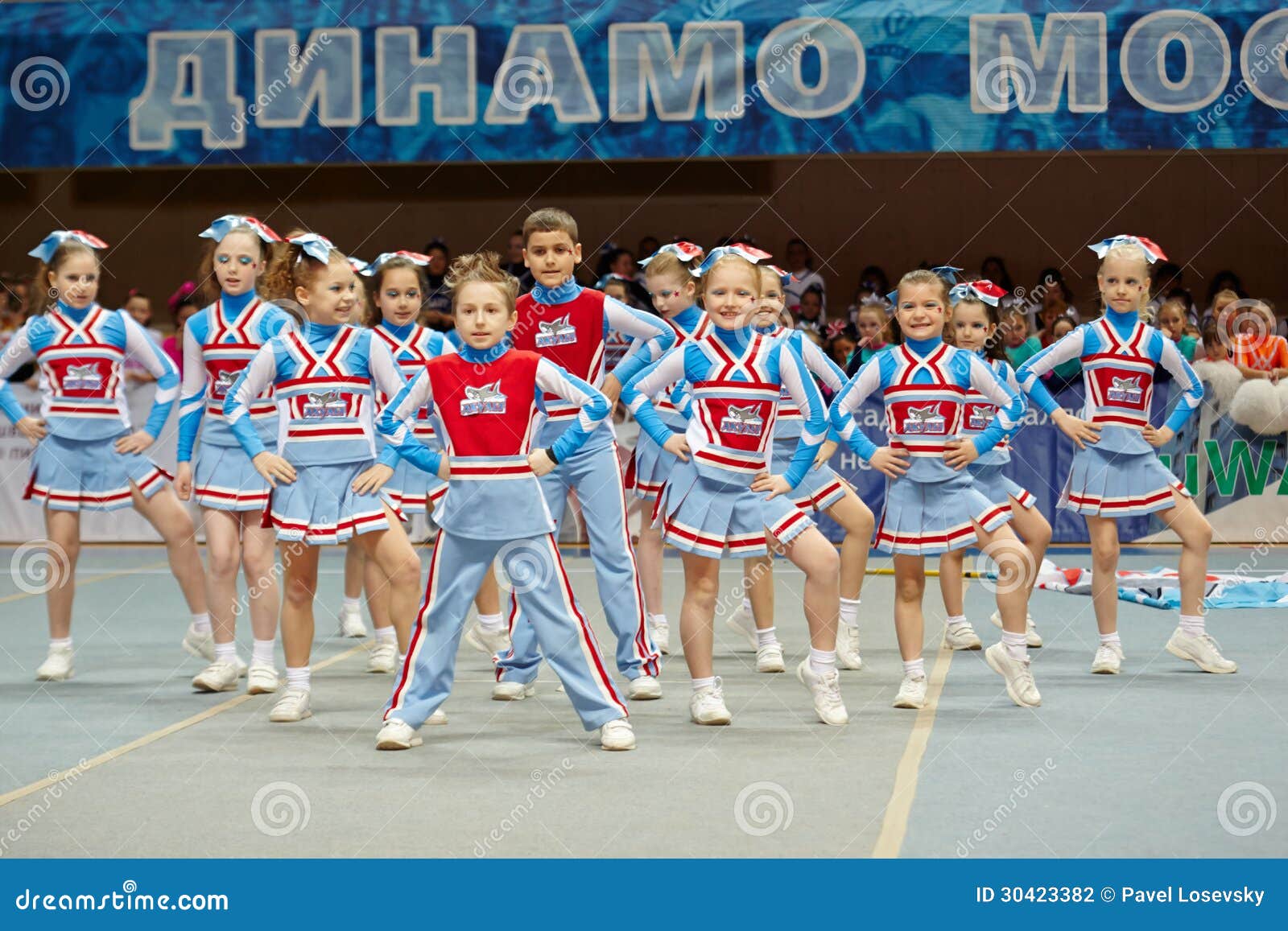 MOSCOW - MAR 24: Performance of children cheerleaders team Sharks at Championship and Contests of Moscow in cheerleading at Palace of Sports Dynamo, March 24, 2012, Moscow, Russia.
