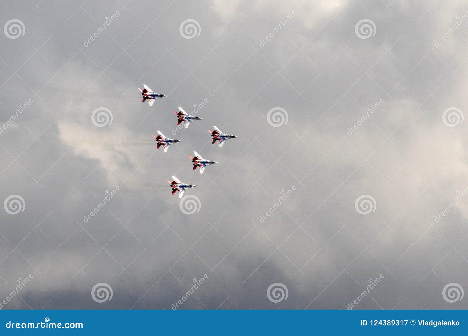 performance of the swifts aerobatic team on multi-purpose highly maneuverable mig-29 fighters over the myachkovo airfield