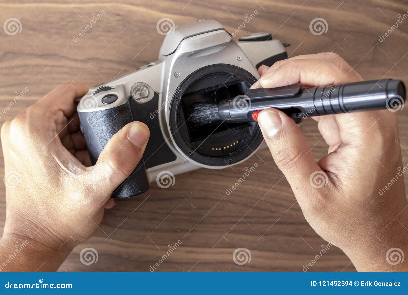 Performing a Maintenance on a Camera Stock Photo Image of lens