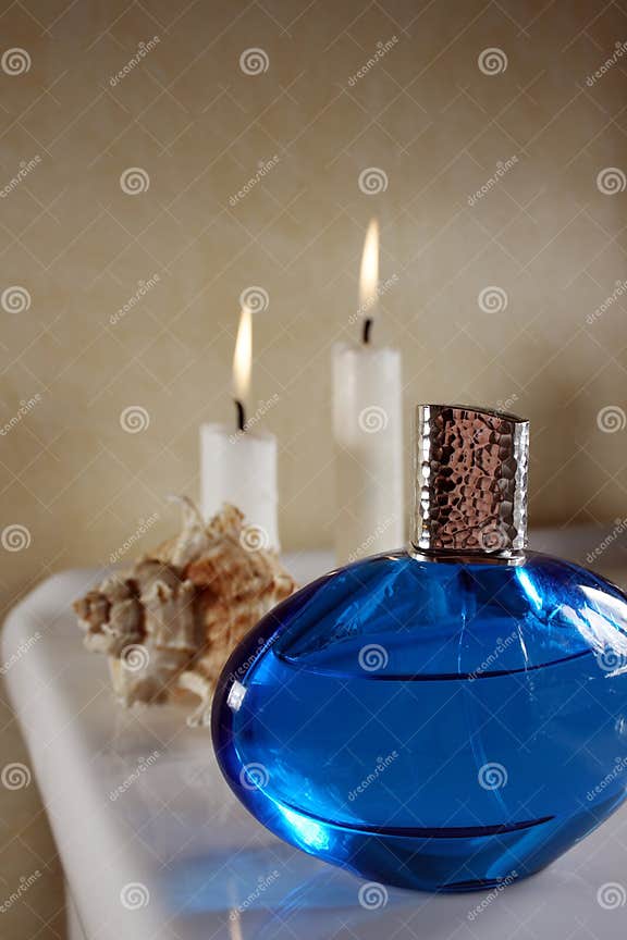 Perfume in blue bottle stock photo. Image of liquid, luxury 4101922