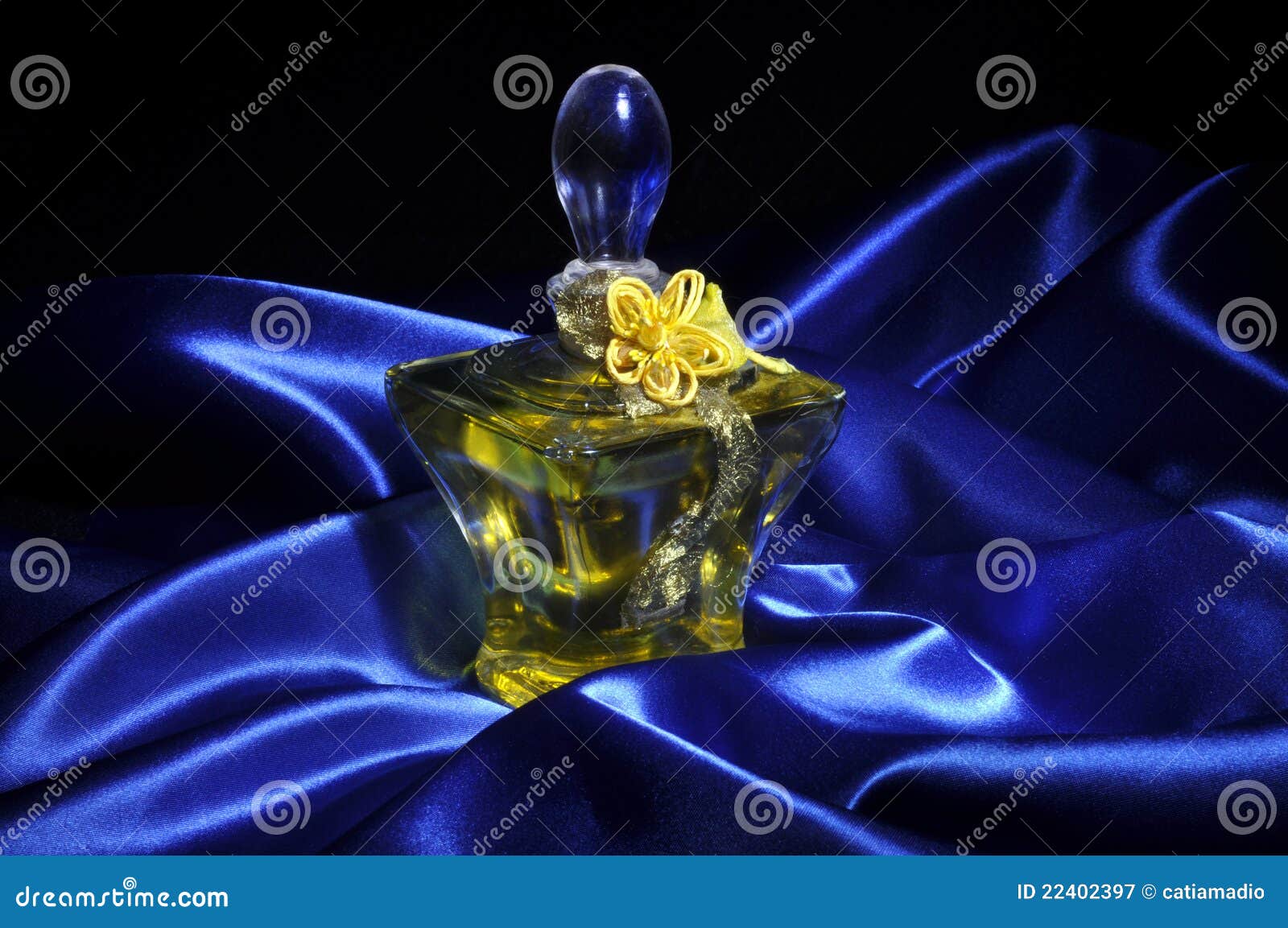 perfume on blue satin
