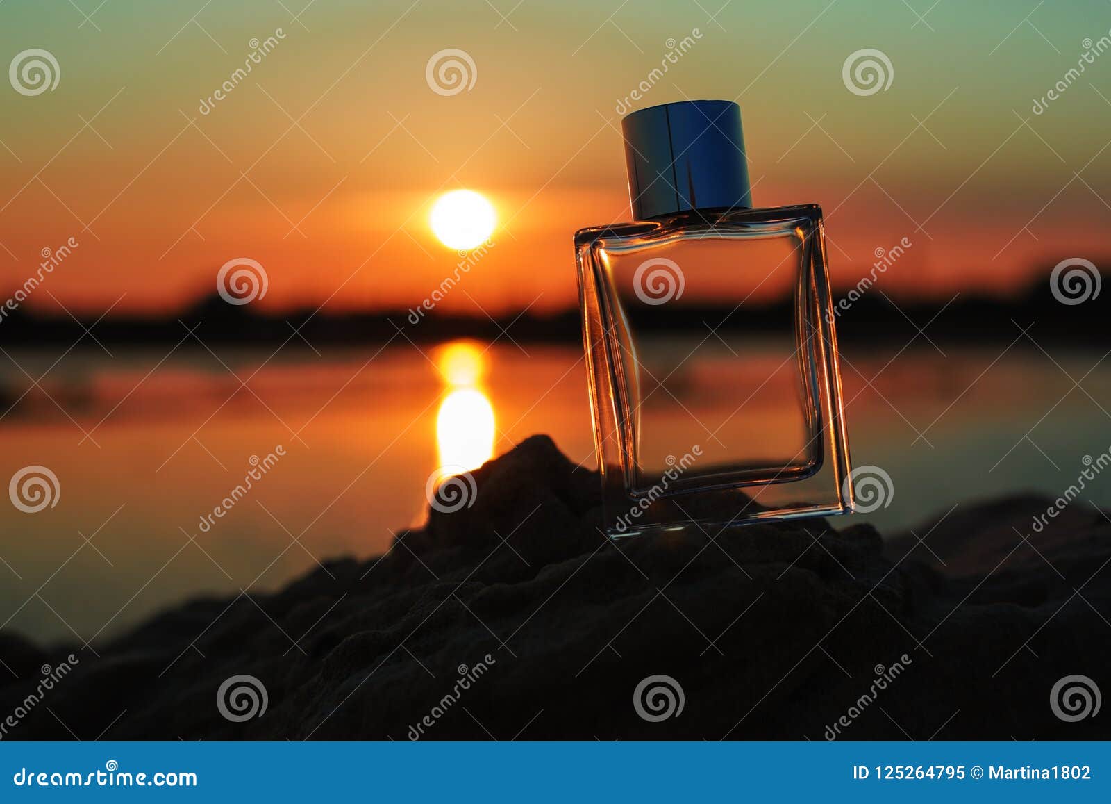 Perfume on sunset stock image. Image of background, cosmetic - 125264795