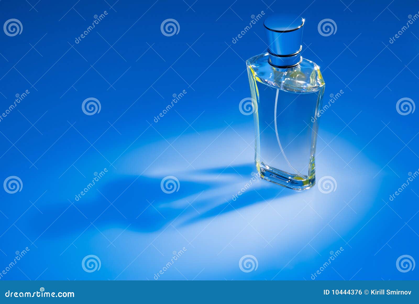 Perfume Bottle On Blue Background Stock Photo Image Of Cosmetics Container