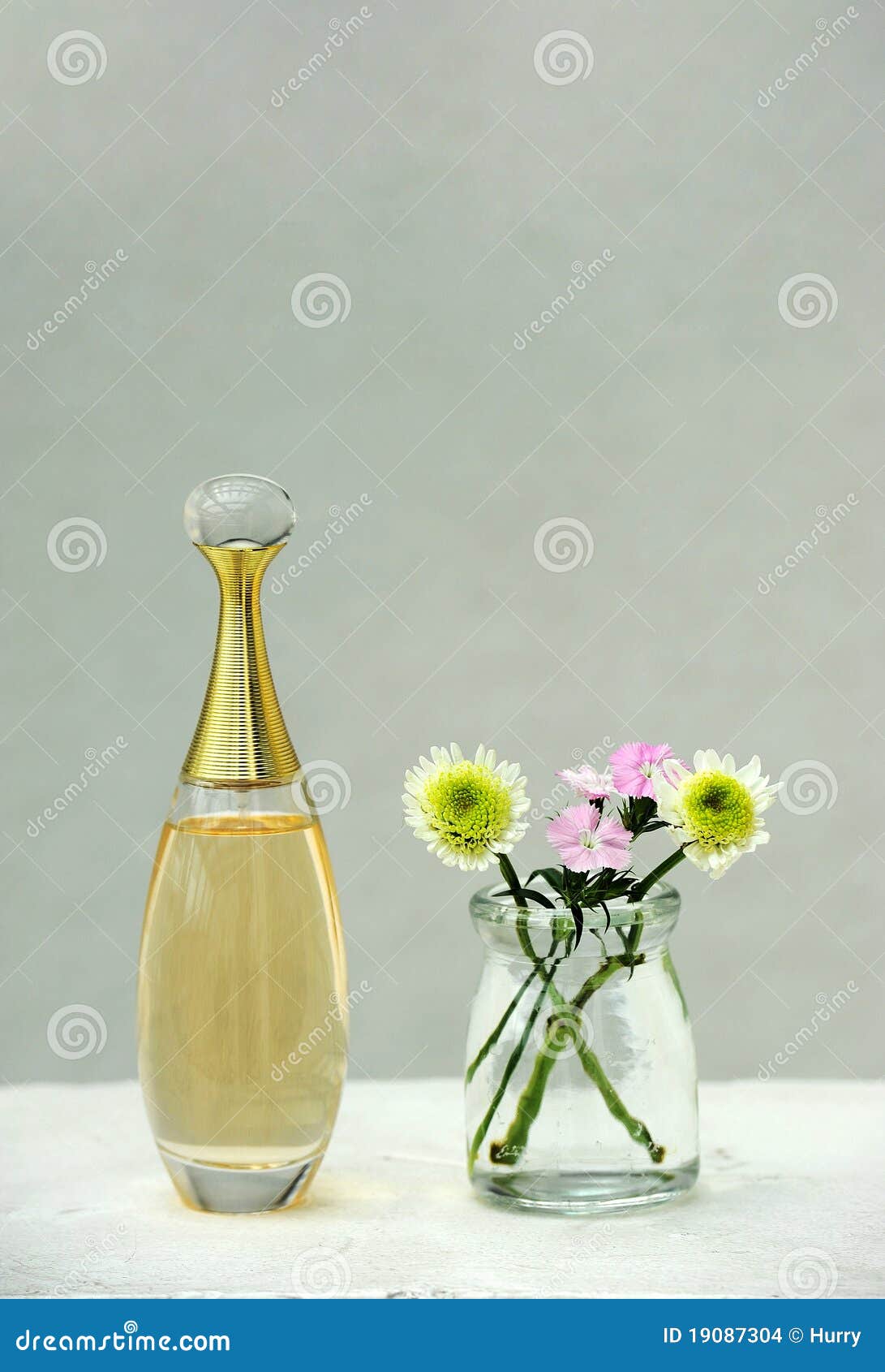 Perfume and flowers stock photo. Image of aromatic, background 19087304