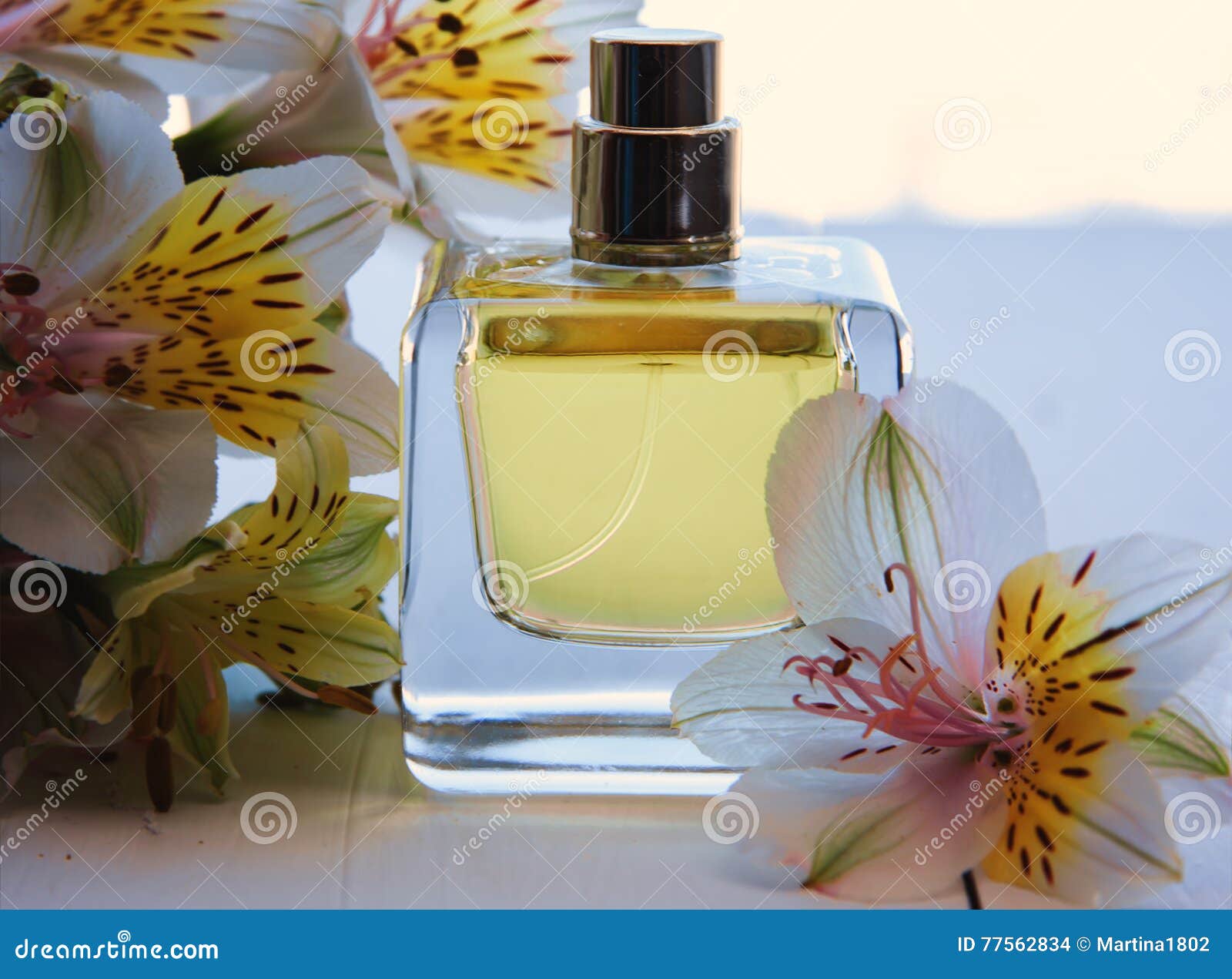 Perfume with flowers stock photo. Image of flower, cosmetic 77562834