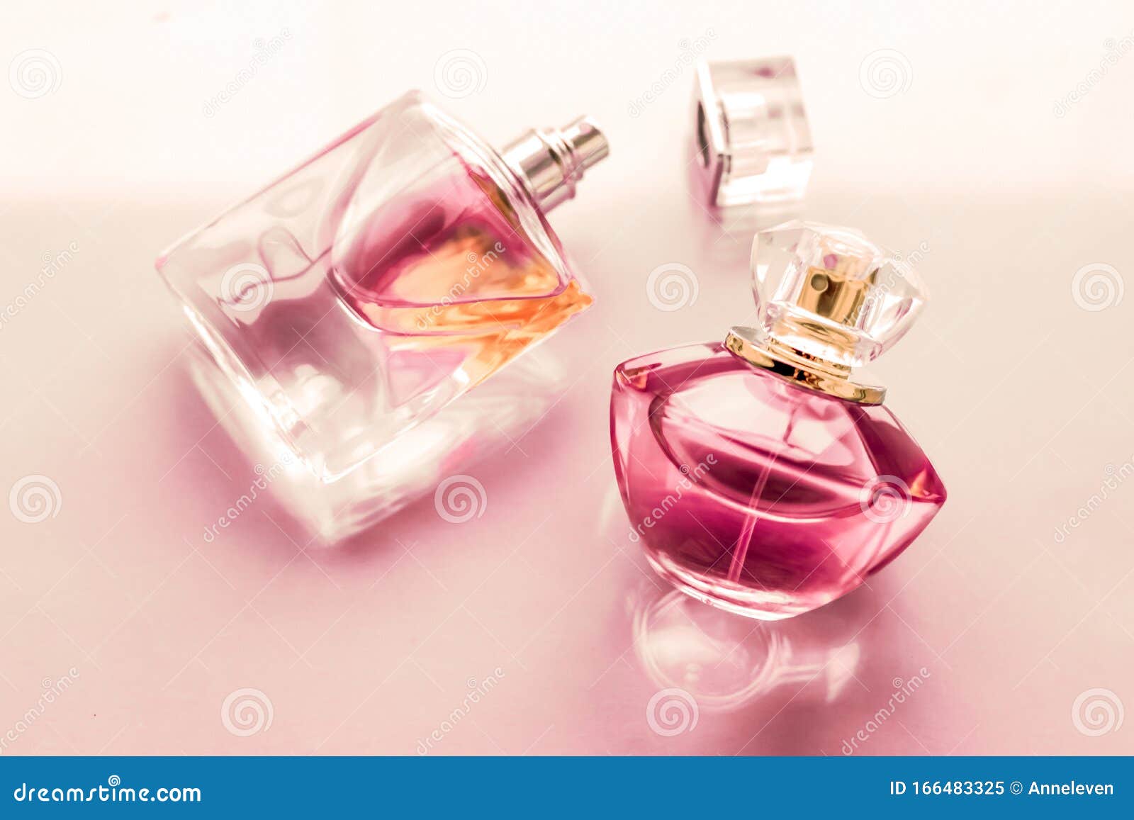 pink perfume bottle on glossy background, sweet floral scent, glamour fragrance and eau de parfum as holiday gift and luxury