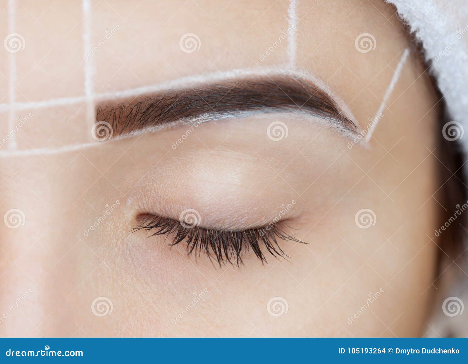 permanent make-up for eyebrows of beautiful woman with thick brows