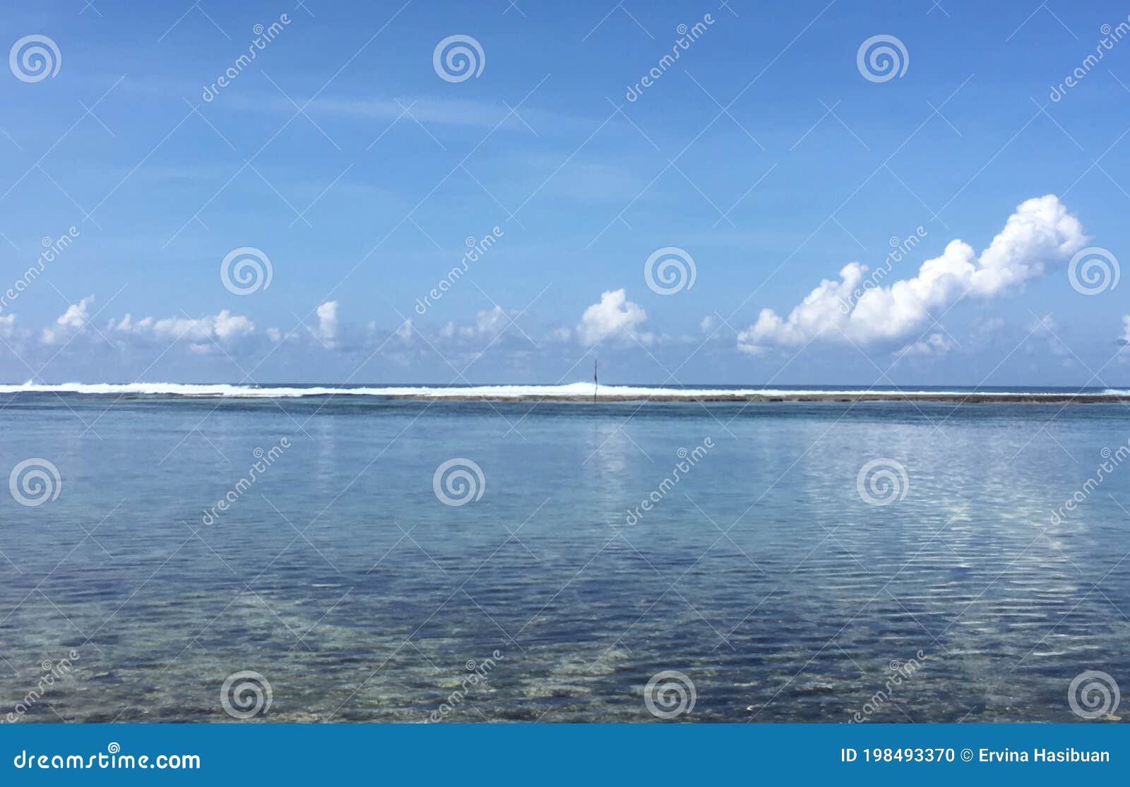 when sky and beach colided become blue at pero beach, sumba.